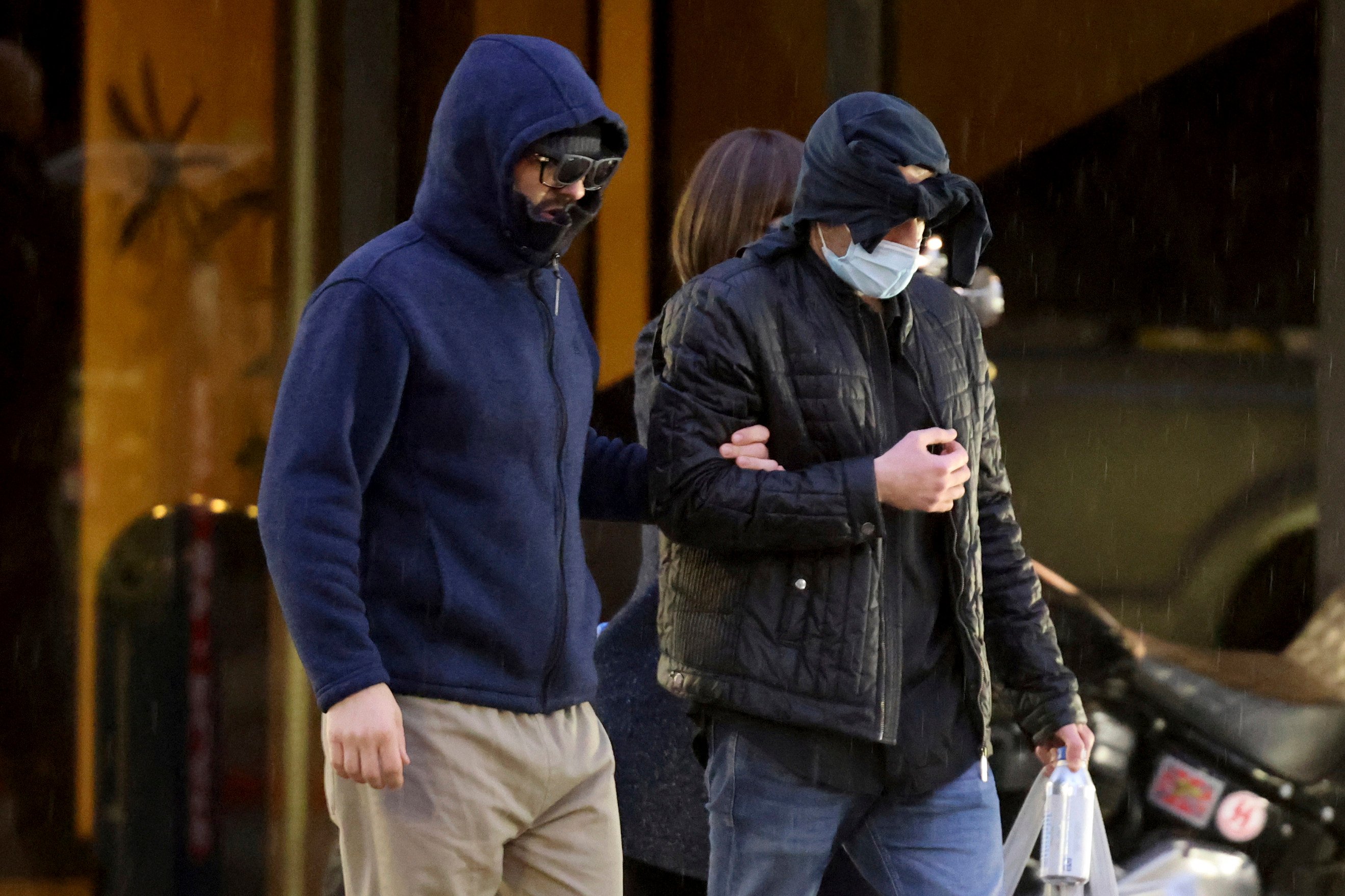 Former FBI informant Alexander Smirnov, left, walks out of his lawyer’s office in Las Vegas in February. File photo: Las Vegas Review-Journal via AP