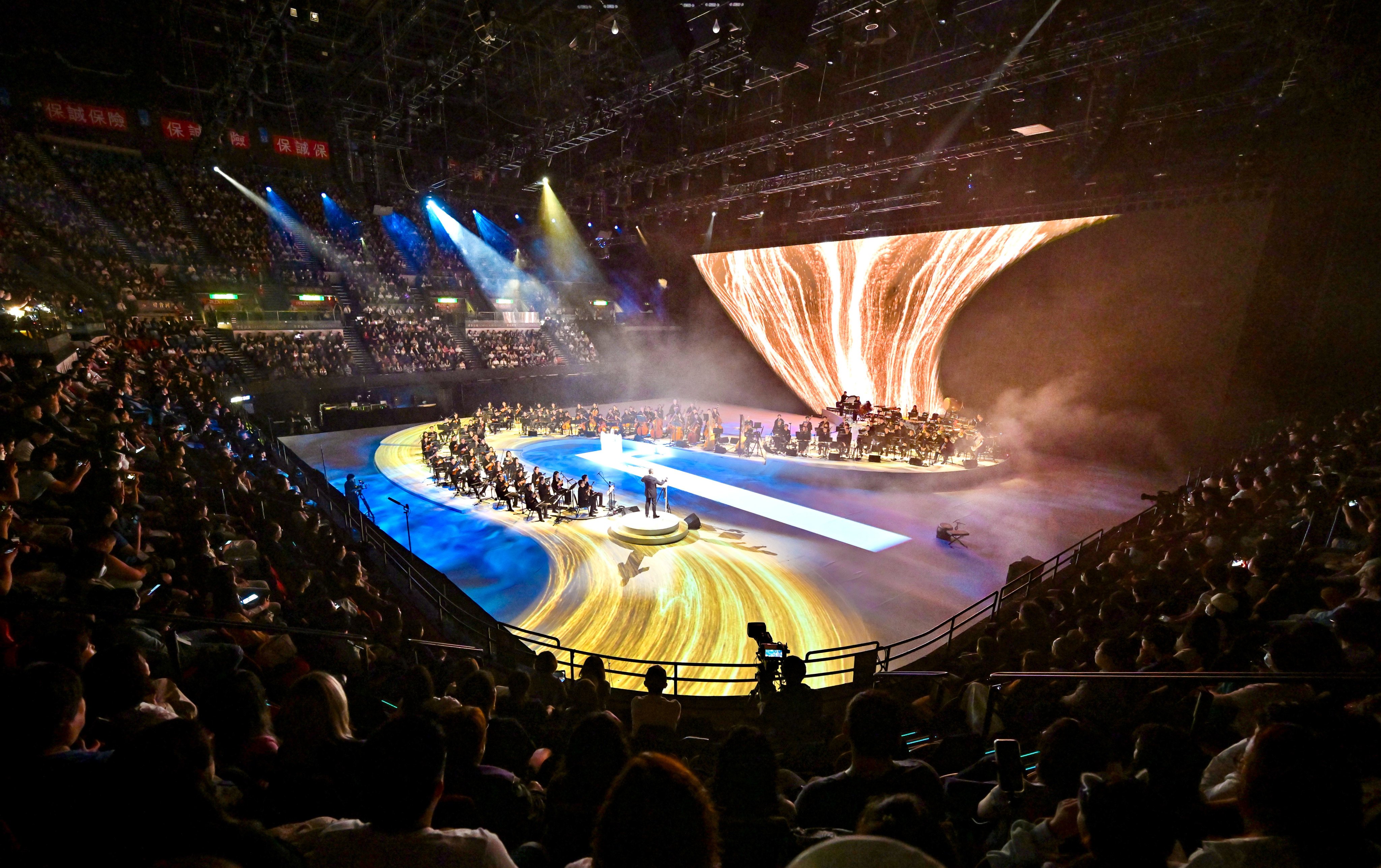 Chinese conductor and composer Tan Dun leads a performance at the Hong Kong Coliseum in October. Photo: Handout