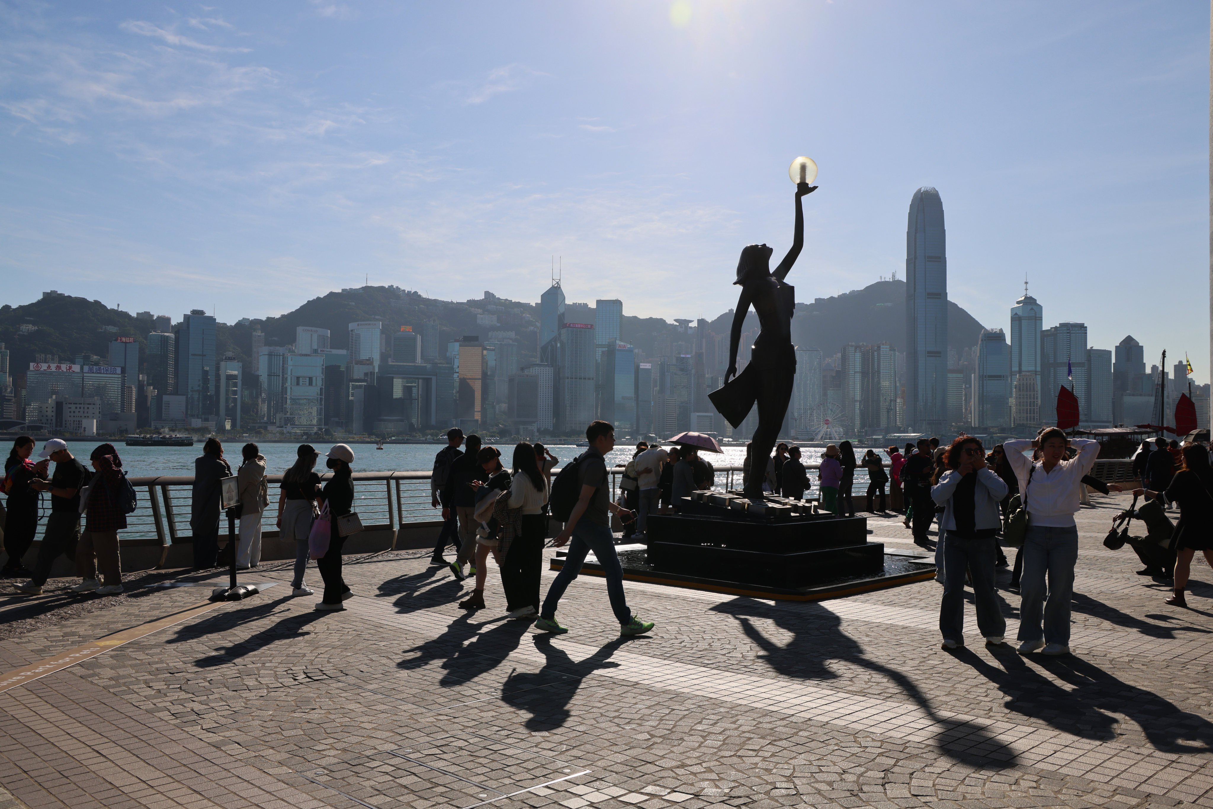 Tourists visit the Tsim Sha Tsui waterfront. Photo: Jelly Tse