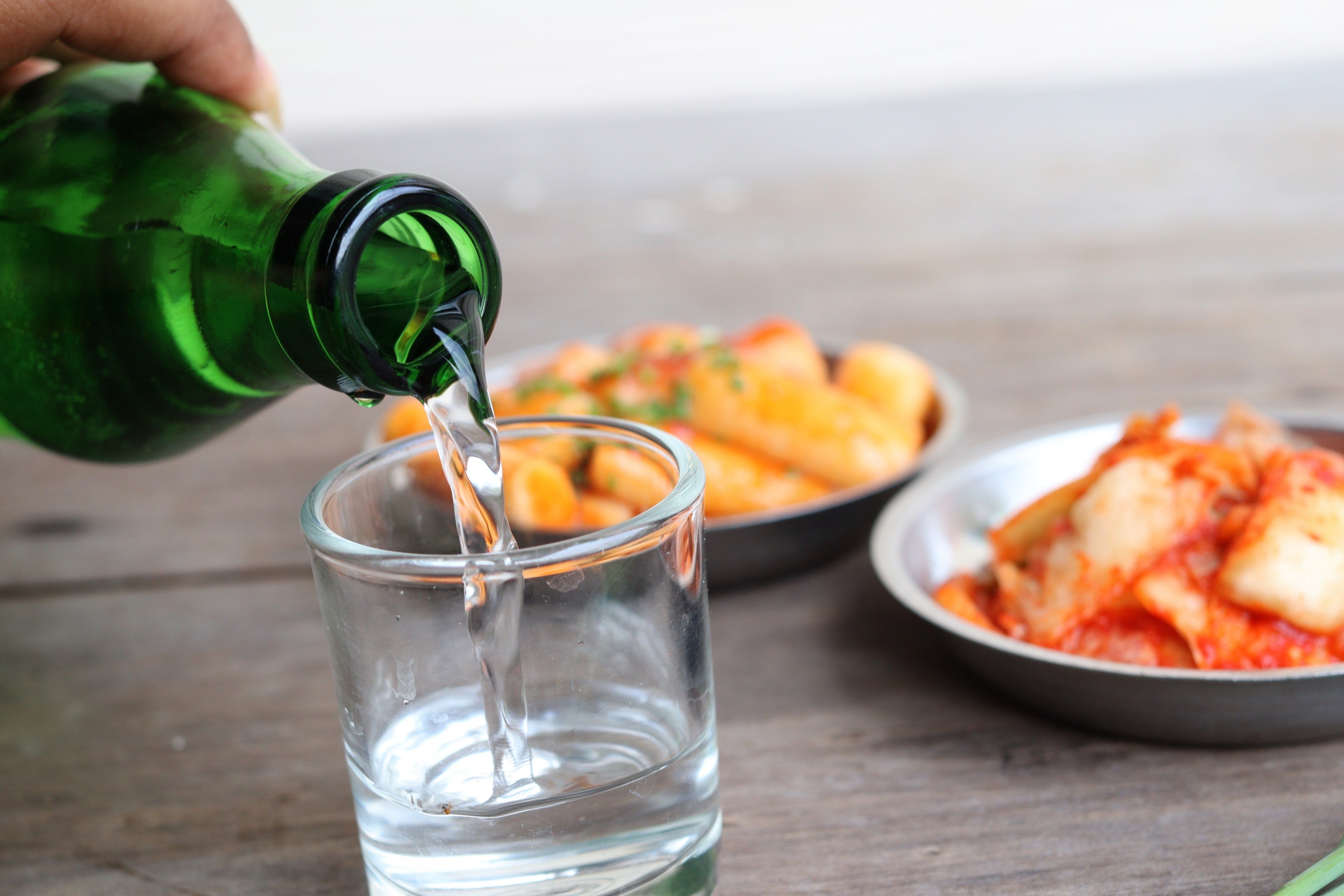 Artist Funnyjun teaches non-Koreans the art of drinking soju in his book How to Drink Soju. He equates a soju drinking session to a polygraph test, because how a person handles it reveals much about their character. Photo: Shutterstock