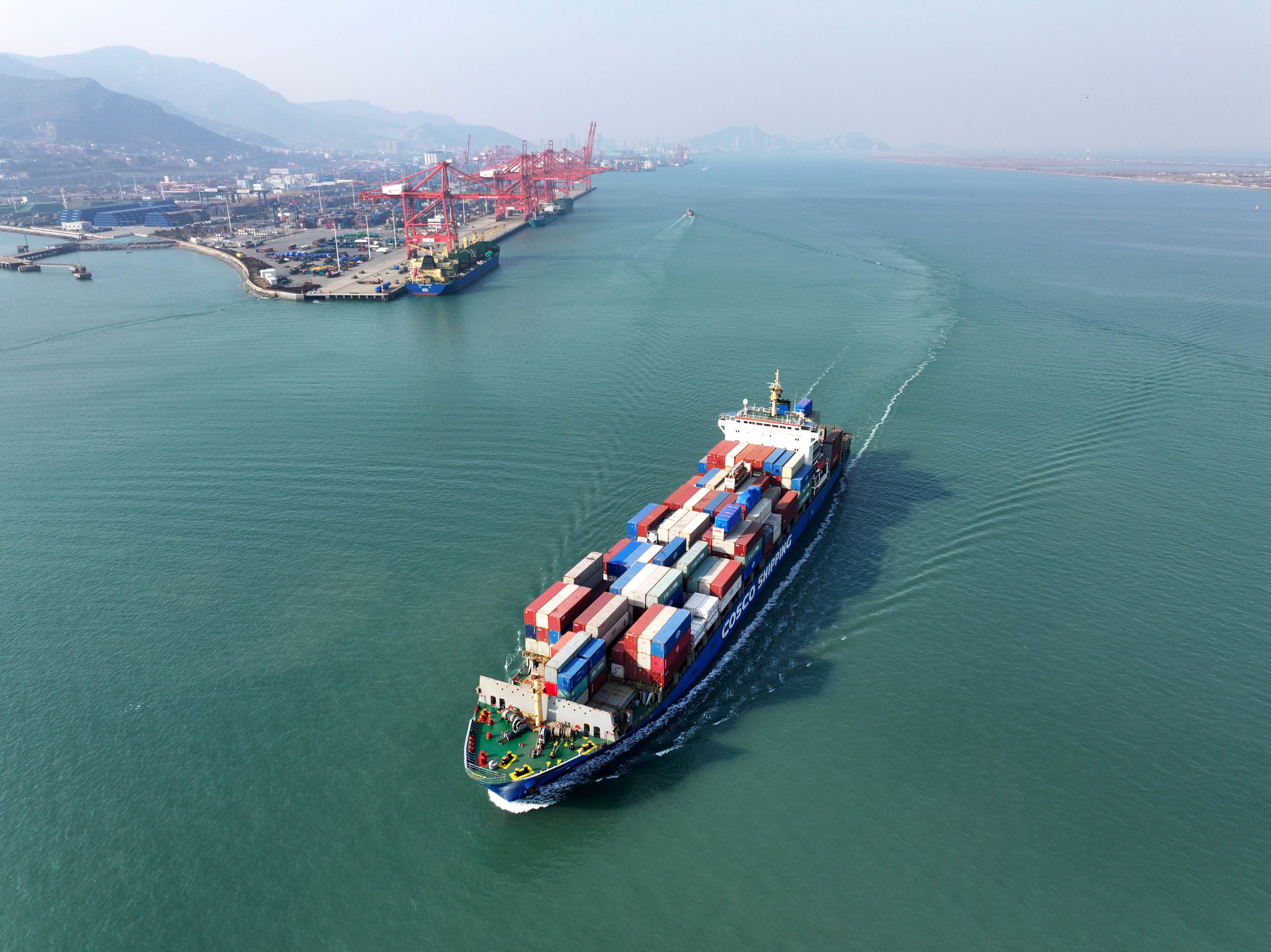 A cargo ship loaded with containers leaves Lianyungang Port, in East China’s Jiangsu province, on December 10. Export rebates rose last month, GF Securities said in a research note released on Tuesday. Photo: Xinhua