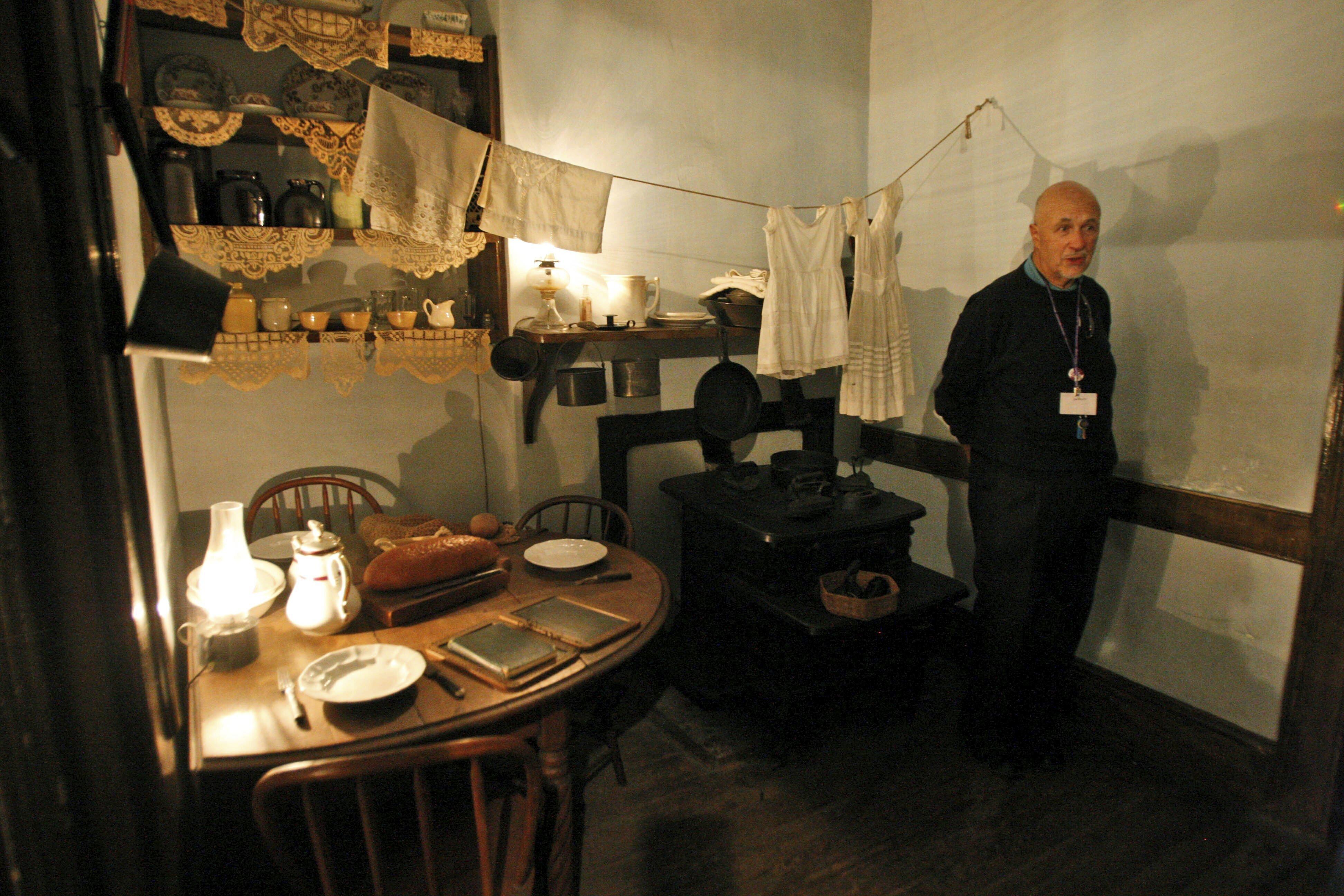 Guide Stephen Flicker speaks during a tour of an apartment inside the Tenement Museum on the Lower East Side in New York. Photo: AP 