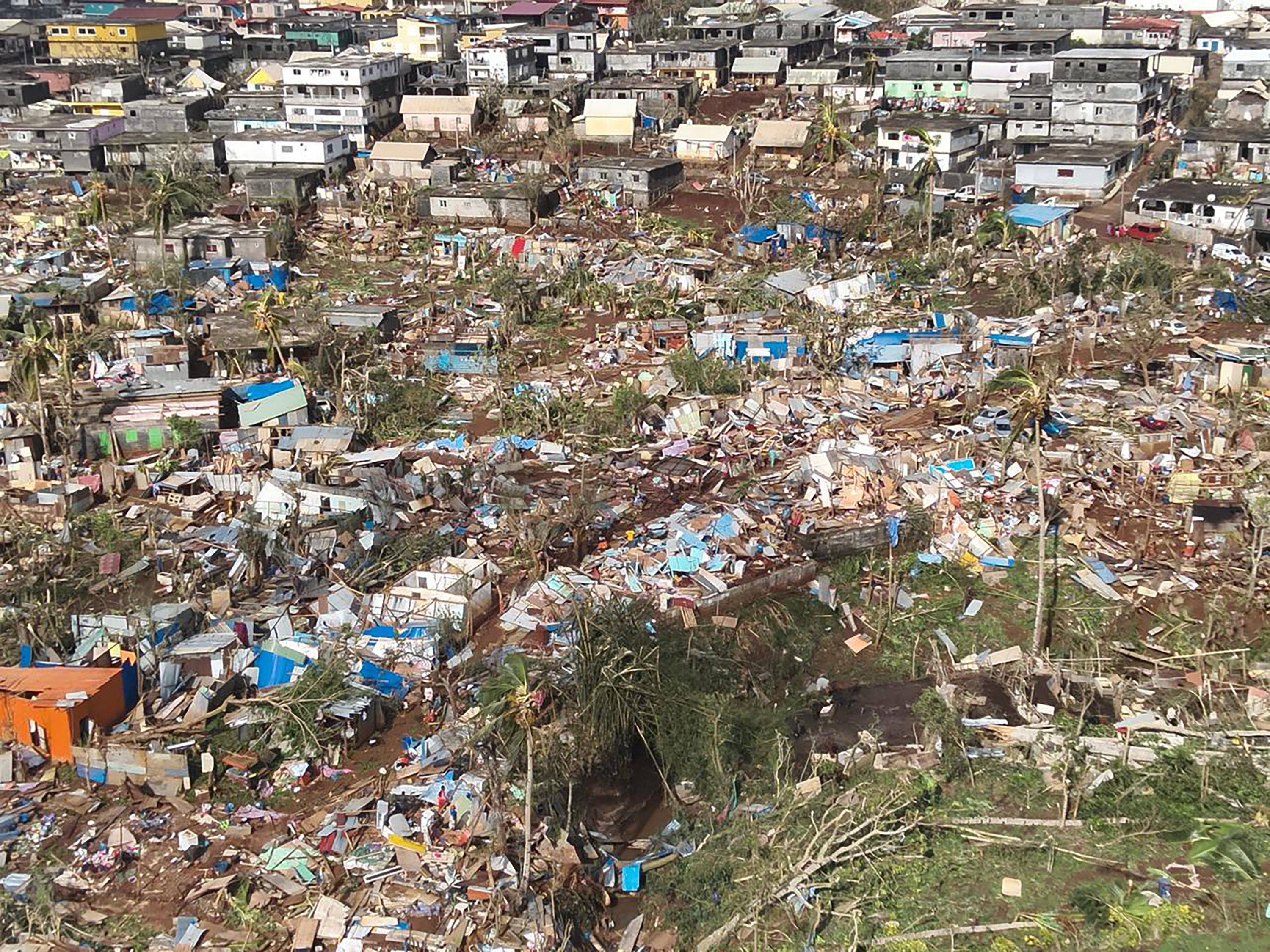 Destroyed housing in Combani, Mayotte after the cyclone hit. Photo: Securite Civile via AFP