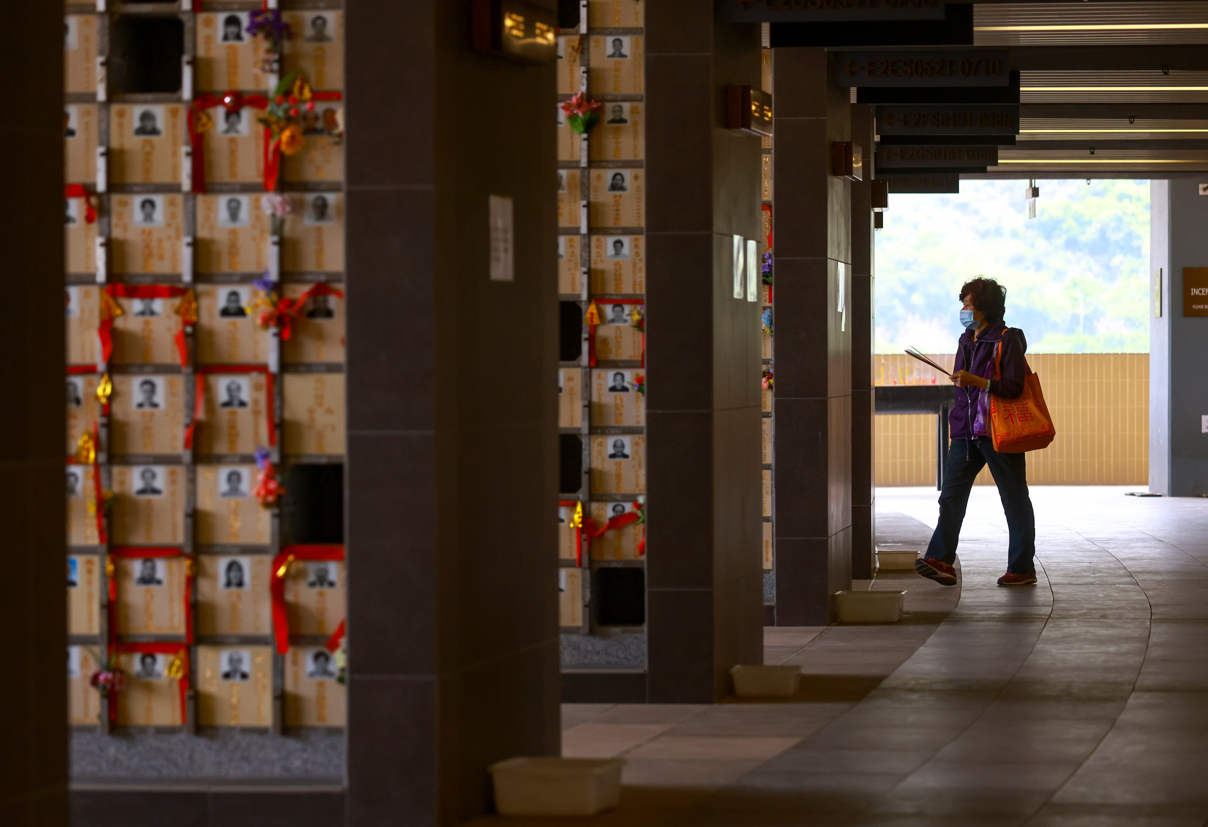 A visitor at Hong Kong’s Tsang Tsui columbarium in Tuen Mun. Photo: May Tse