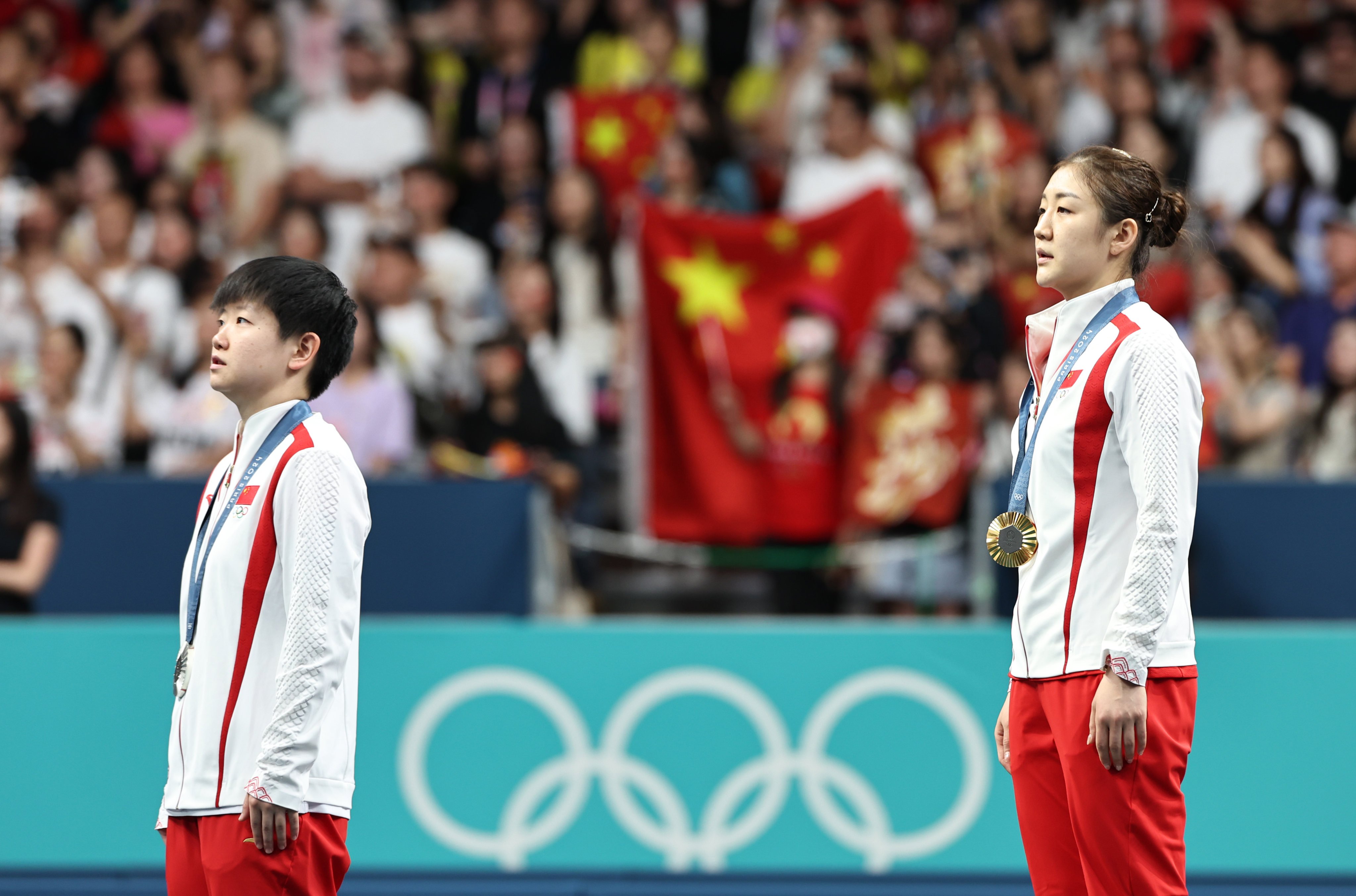 The public apology expressed “deepest apology” after sharing a fake video that damaged the reputations of Olympic champions Chen Meng (right) and silver medallist Sun Yingsha. Photo: Xinhua