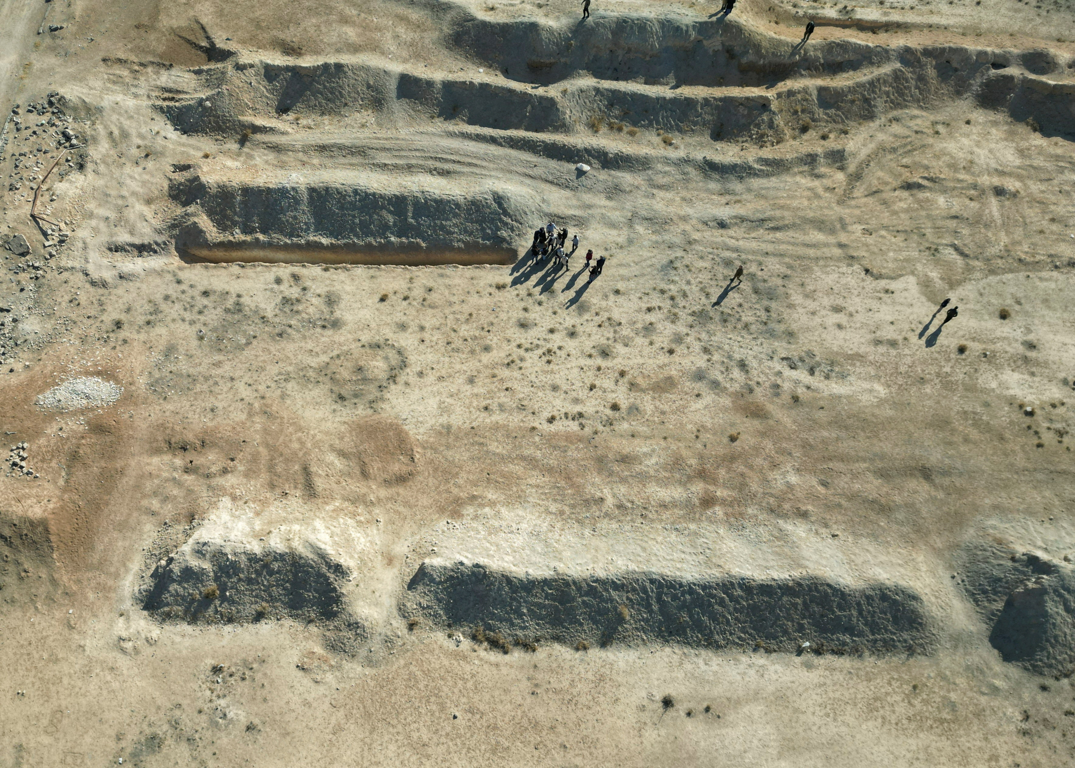 A drone view shows the site of a mass grave in Najha, Syria. Photo: Reuters