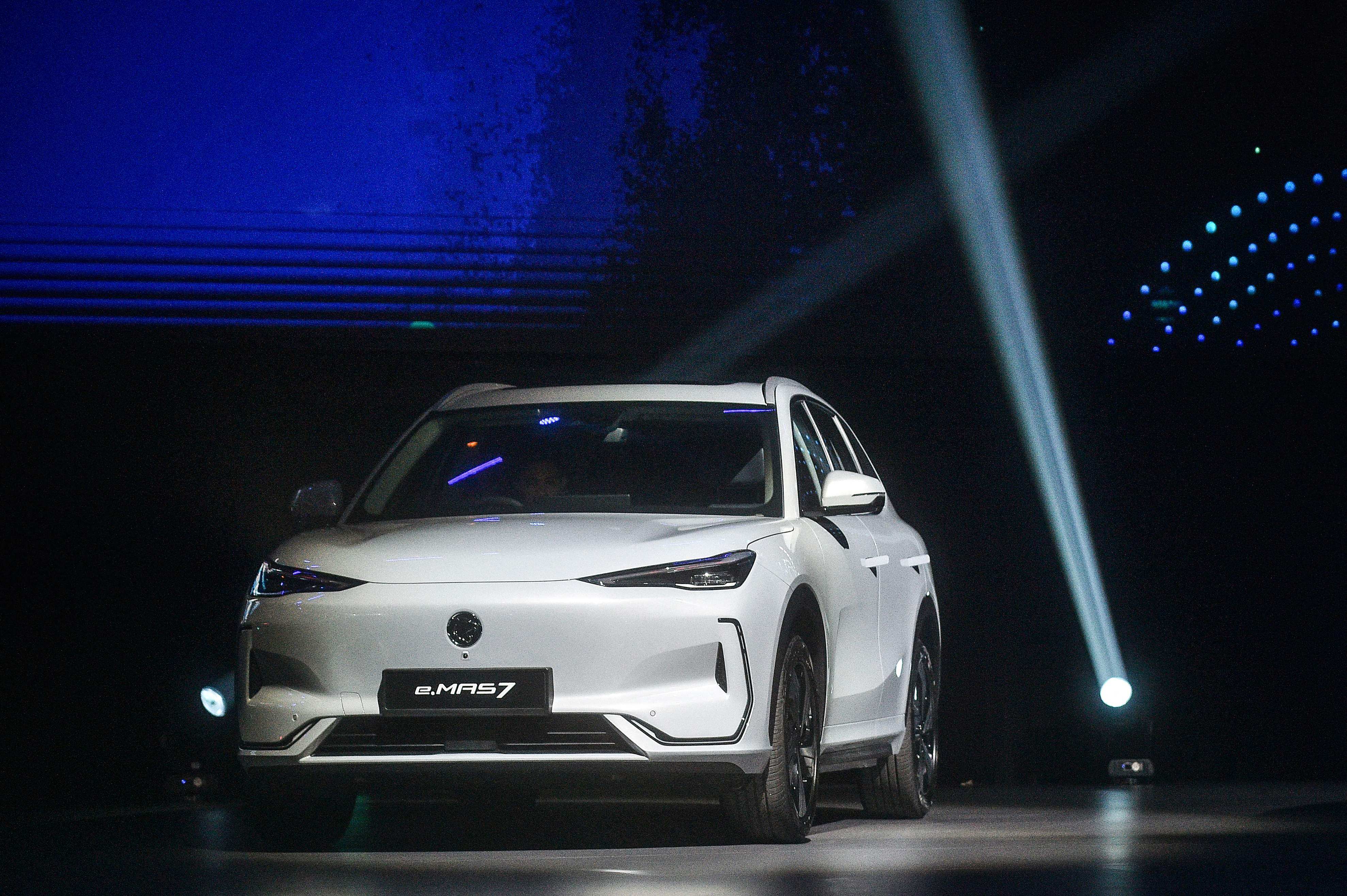 Malaysia’s first locally produced electric vehicle, the e.Mas7, was launched in Kuala Lumpur on December 16. Photo: AFP
