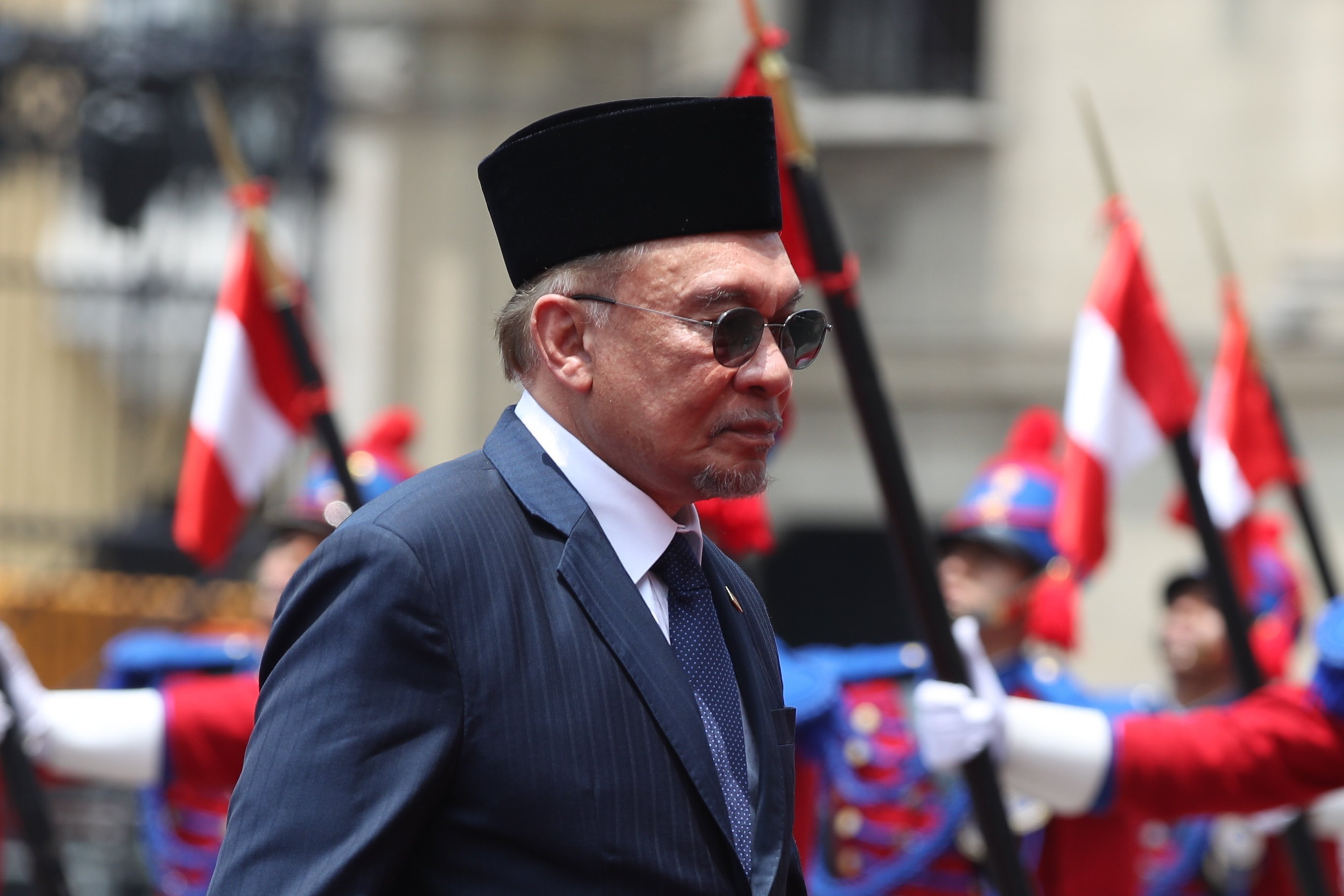 Malaysia’s Prime Minister Anwar Ibrahim attends a welcome ceremony at the Government Palace in Lima, Peru on November 13. Photo: EPA-EFE