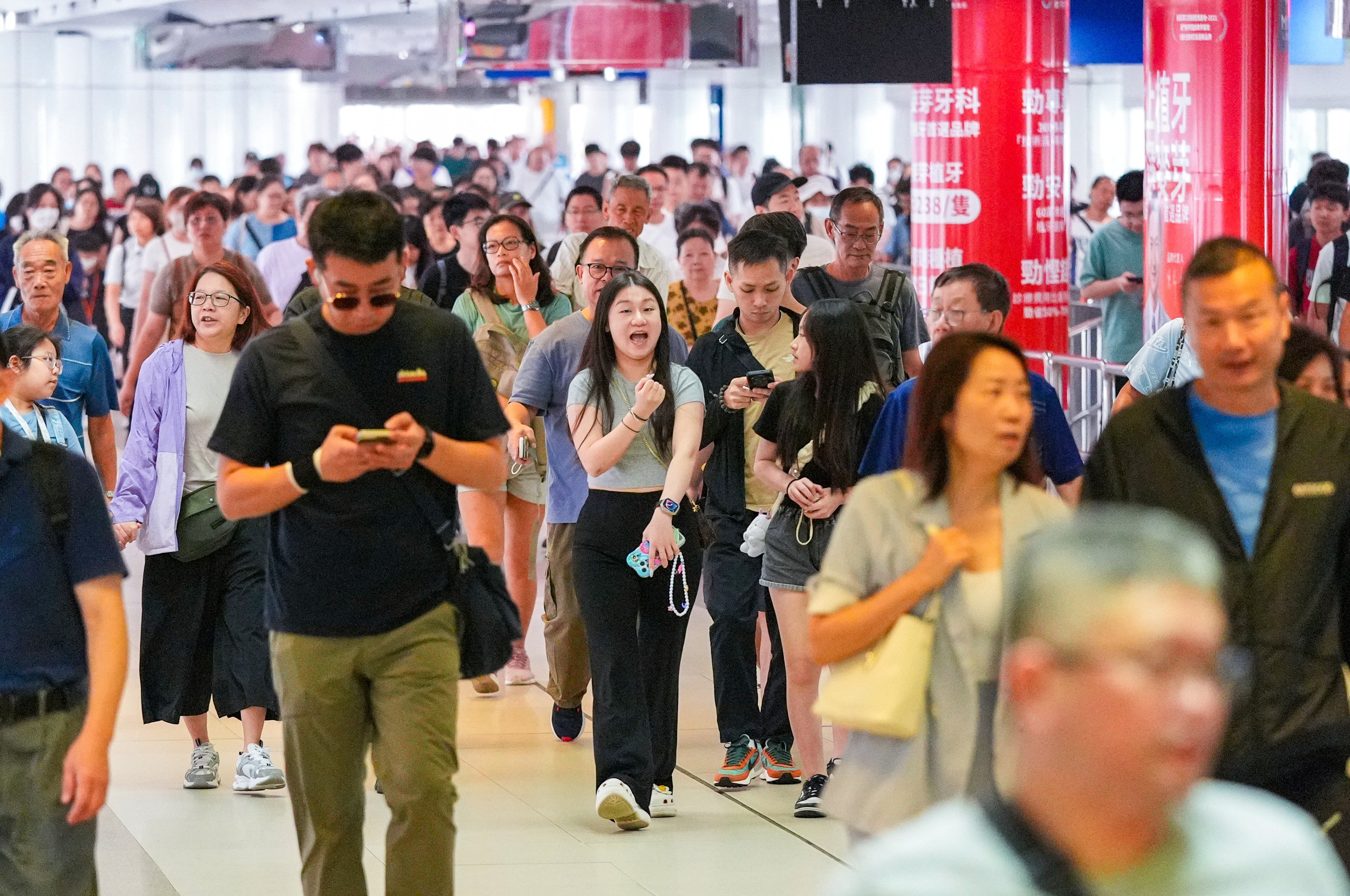 Hongkongers head to Shenzhen via Lo Wu station during the National Day holiday in October. Photo: Eugene Lee