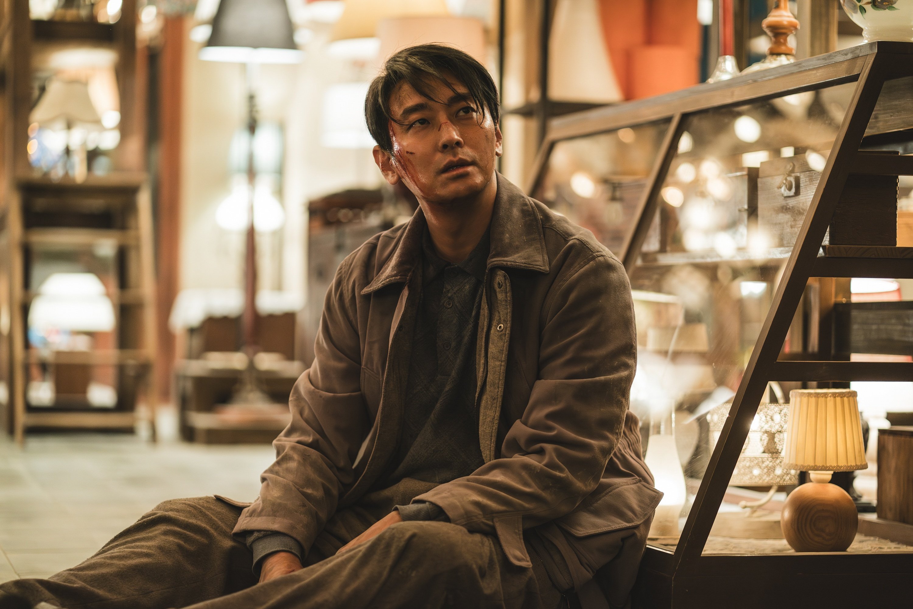 Ju Ji-hoon in a still from Light Shop. Photo: Disney+.