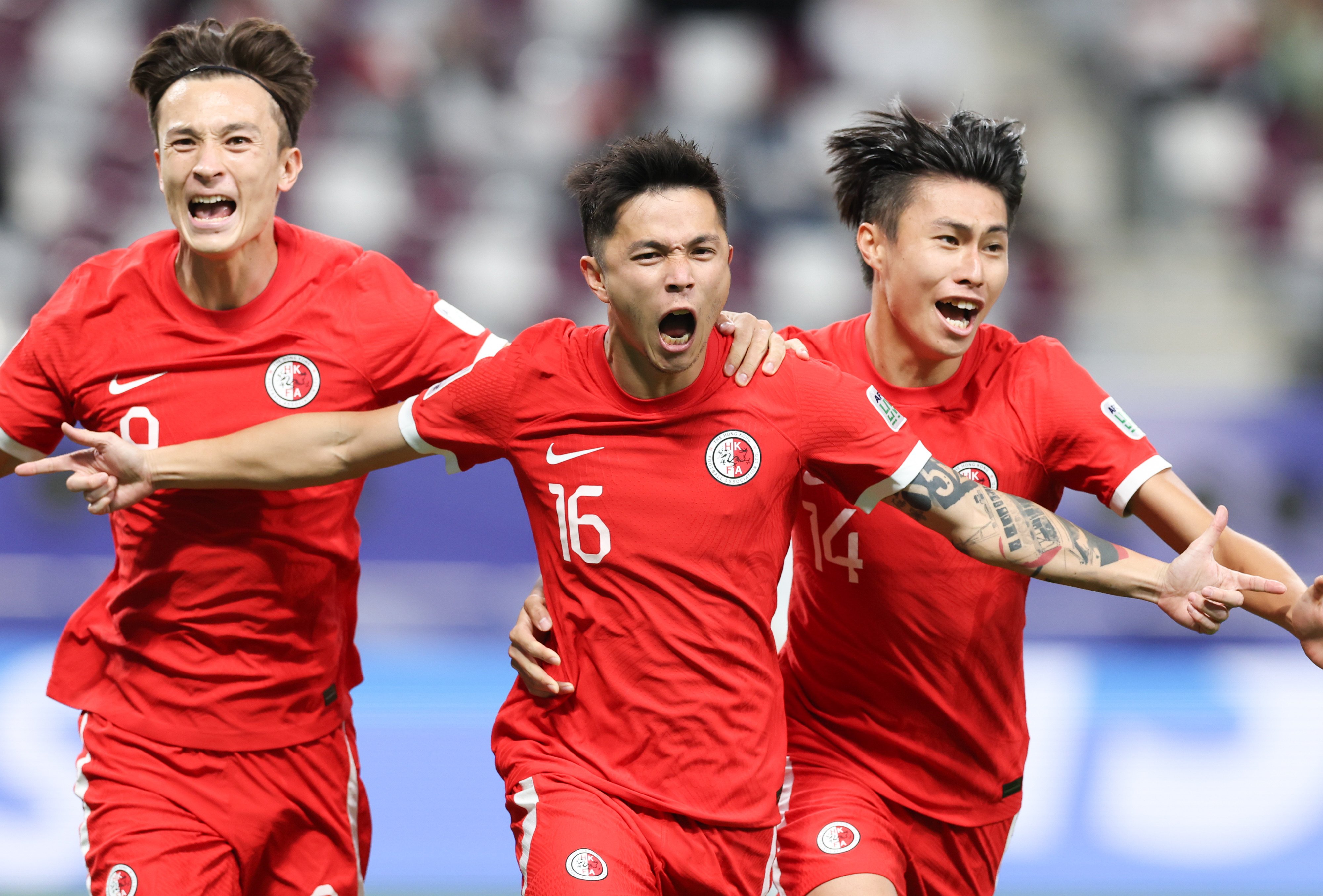 Philip Chan (centre) celebrates scoring for Hong Kong against the United Arab Emirates in this year’s AFC Asian Cup. Photo: Xinhua