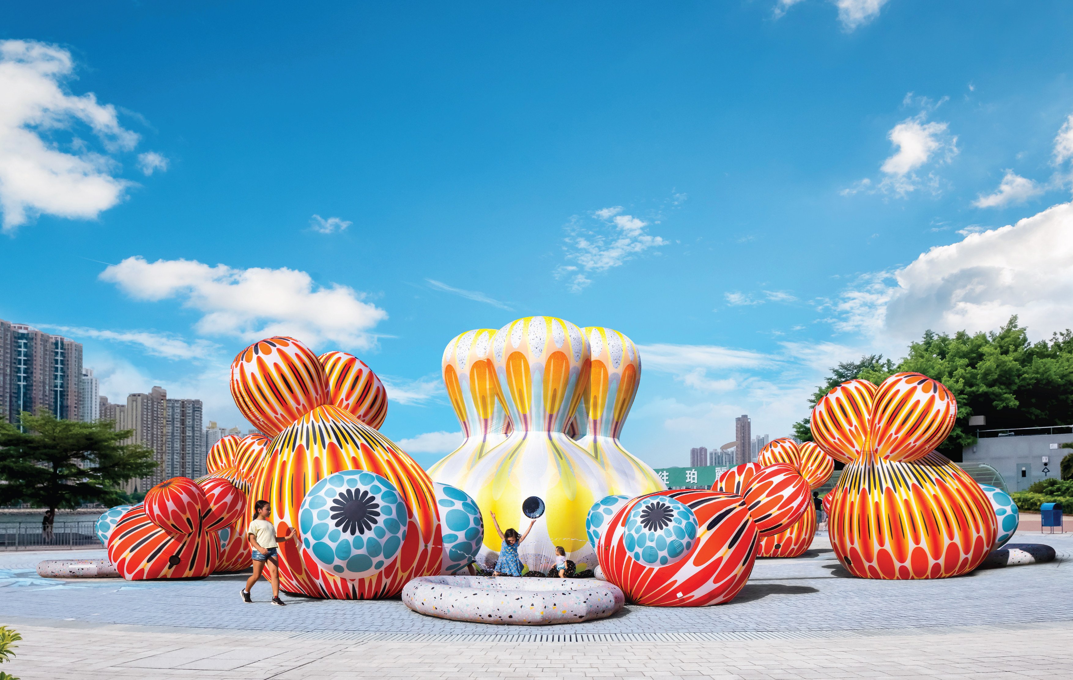 An interactive inflatable fountain designed to resemble a school of koi in Tsuen Wan Park in Hong Kong. Photo: Design District Hong Kong