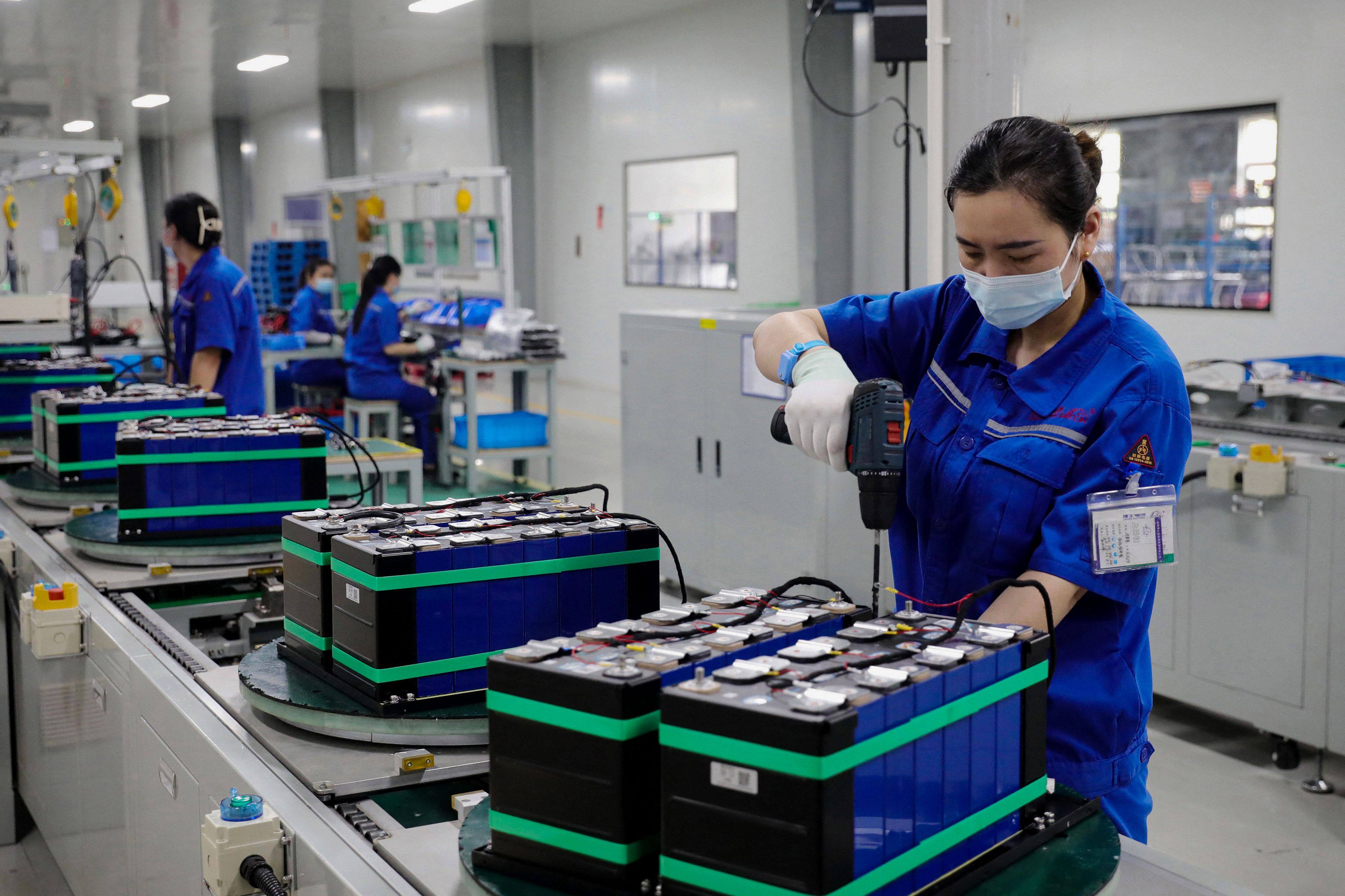 Employees inside at a factory producing lithium battery for export in Huaibei in eastern Anhui province. Photo: AFP