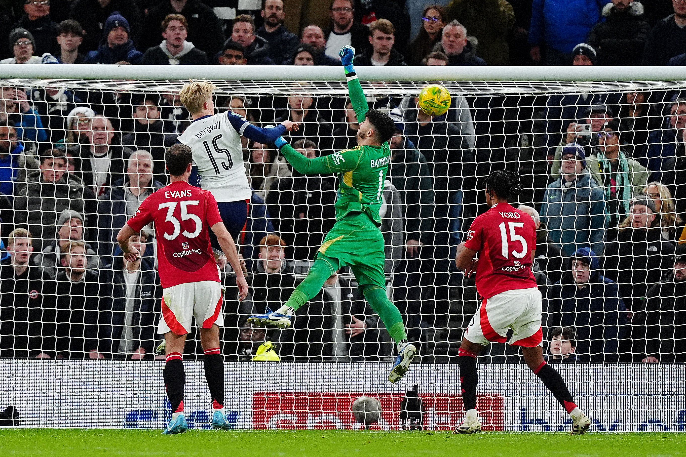 Manchester United goalkeeper Altay Bayindir  fails to stop Tottenham Hotspur’s Son Heung-Min from scoring his side’s fourth. Photo: DPA