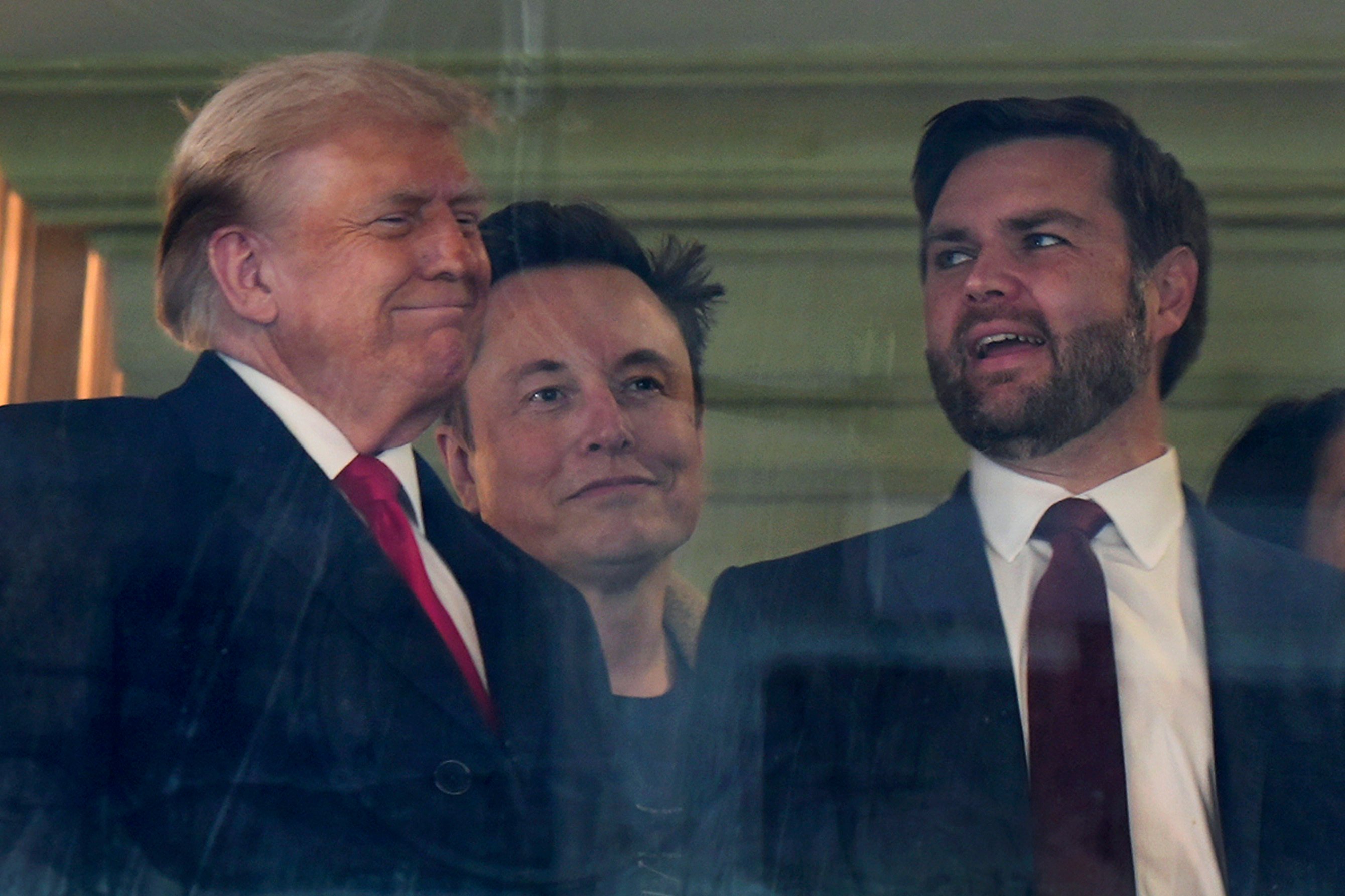 President-elect Donald Trump, Elon Musk and Vice-President-elect J.D. Vance at a NCAA college football game between Army and Navy. Photo: AP