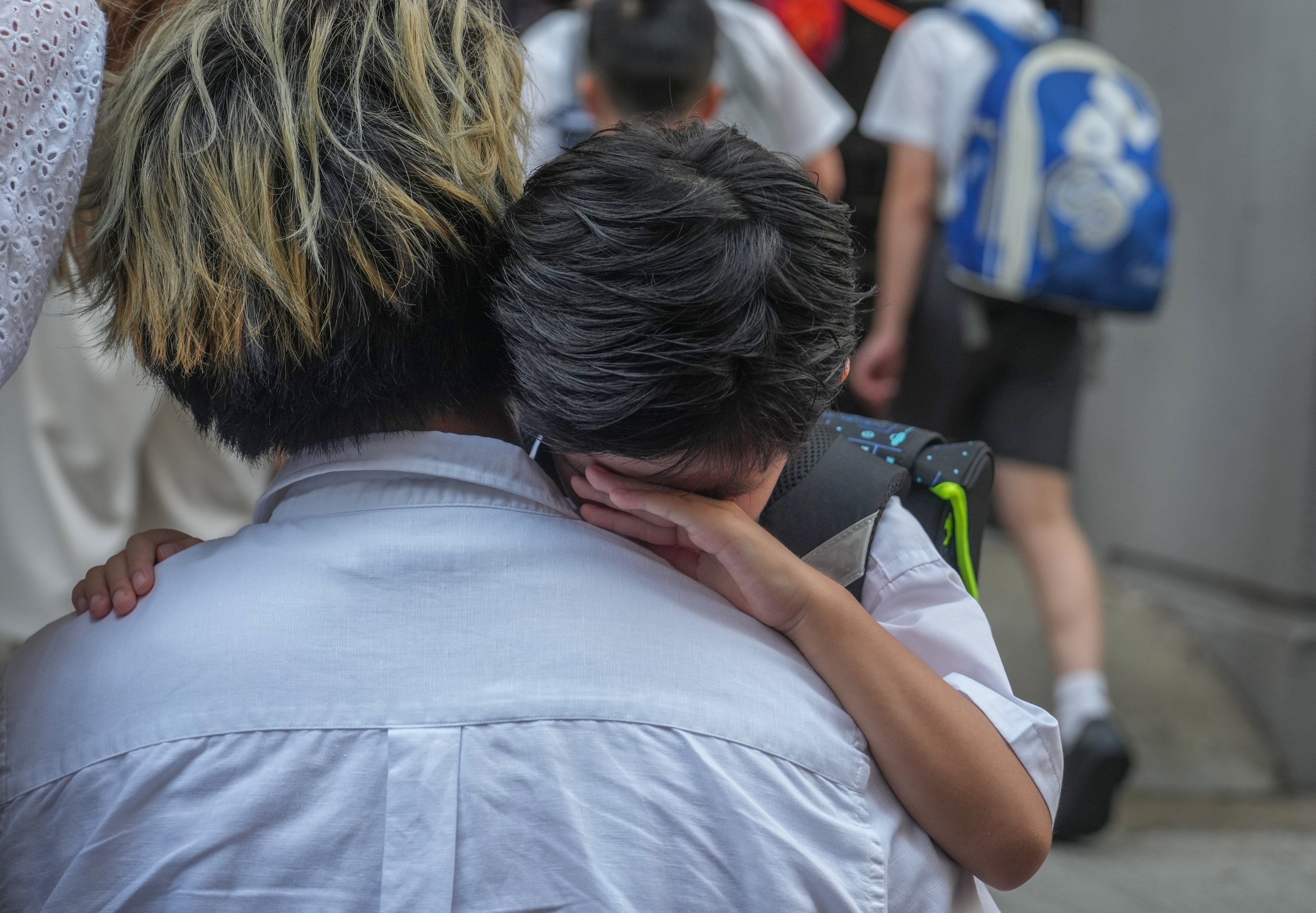 Students go to school in Wan Chai on September 2, the first day of the academic year. Photo: Sam Tsang