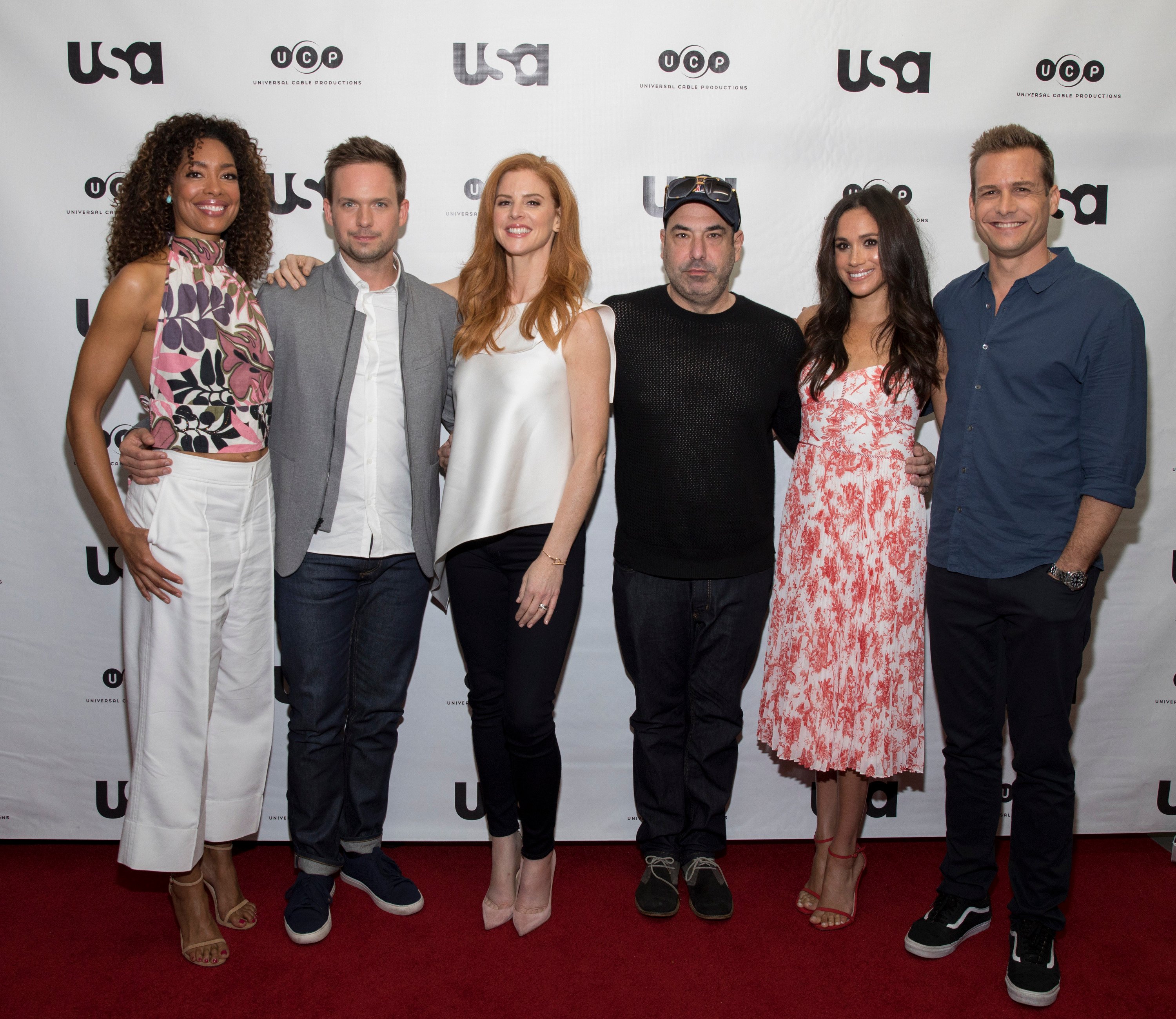 Where is the cast of Suits nows? (From left) Gina Torres, Patrick J. Adams, Sarah Rafferty, Rick Hoffman, Meghan Markle and Gabriel Macht, pictured in June 2017. Photo: Getty Images