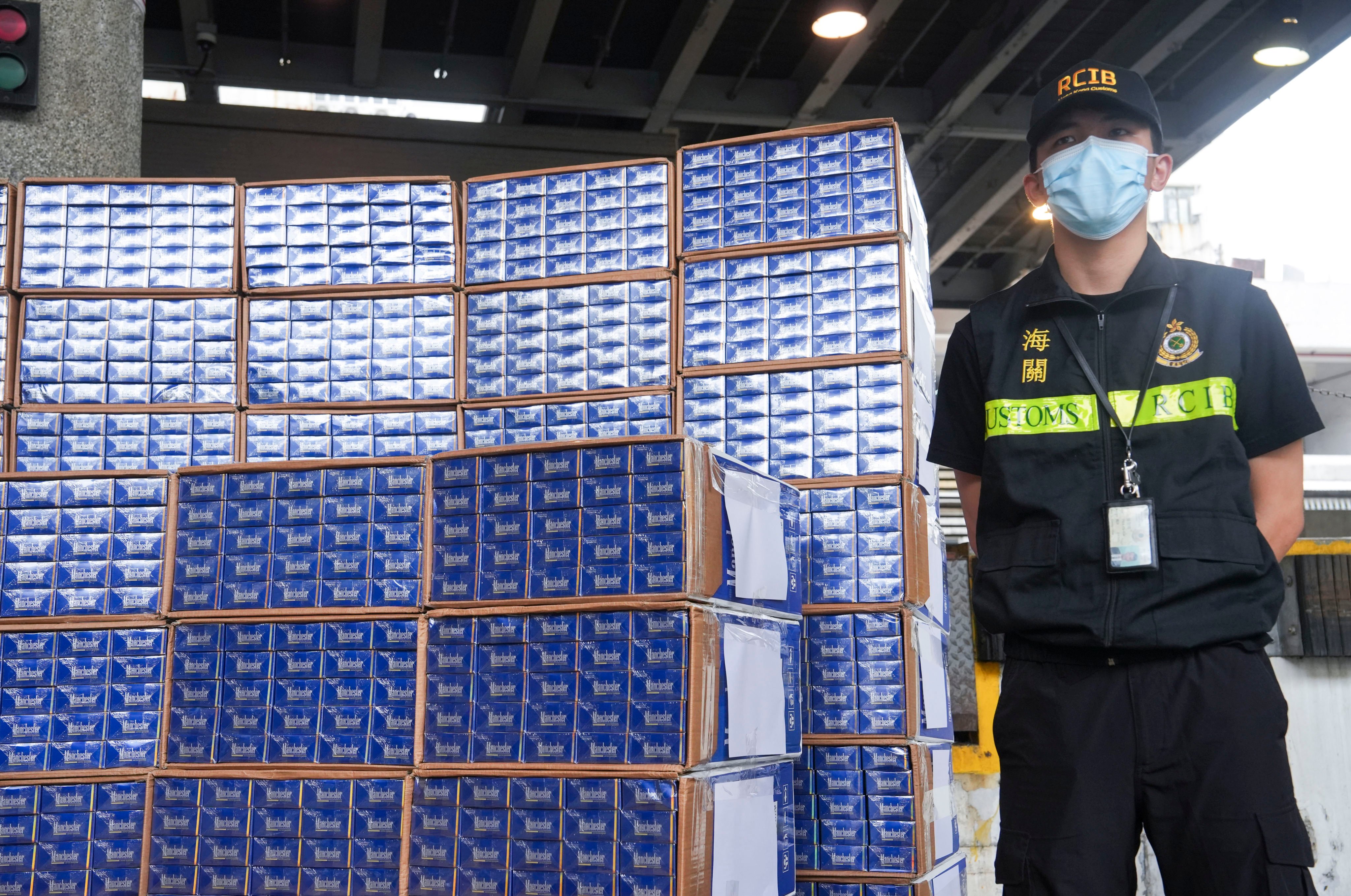 Seized black market cigarettes are displayed by customs. In the first 11 months of this year, 18,780 people were arrested for smuggling, storing, distributing or peddling illicit cigarettes, a 71 per cent increase over the 10,995 arrests made during all of 2023. Photo: Sun Yeung