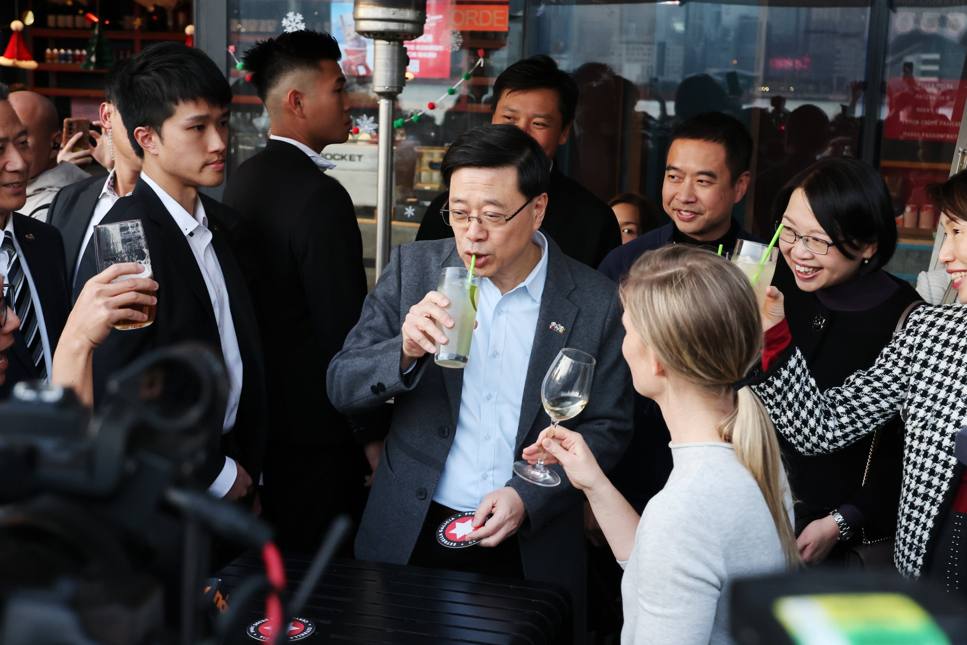 Chief Executive John Lee Ka-chiu visits a Christmas-themed outdoor fair on the plaza at Tsim Sha Tsui waterfront area. Photo: SCMP / Jelly Tse