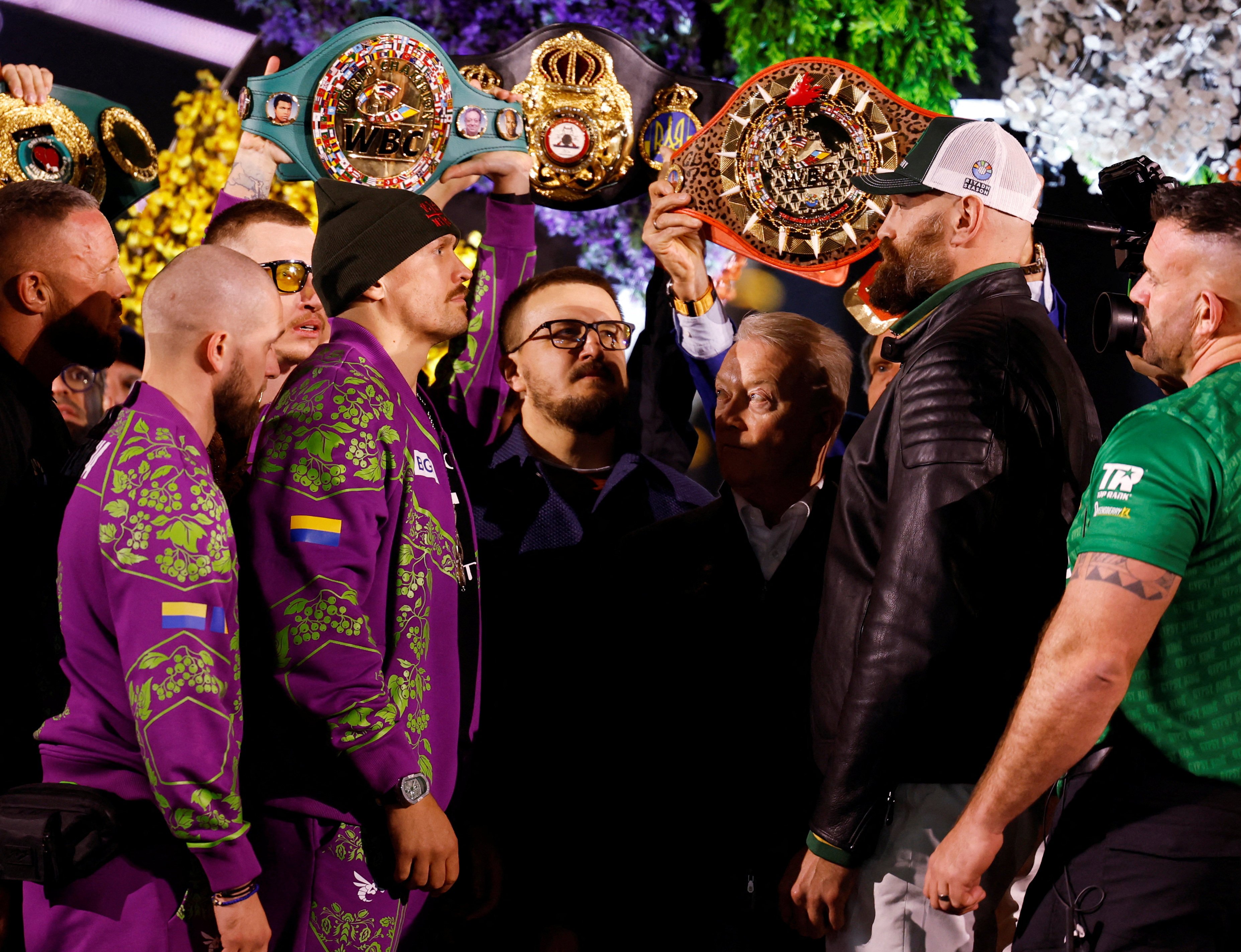 Oleksandr Usyk (left) and Tyson Fury face off during the weigh-in. Photo: Reuters