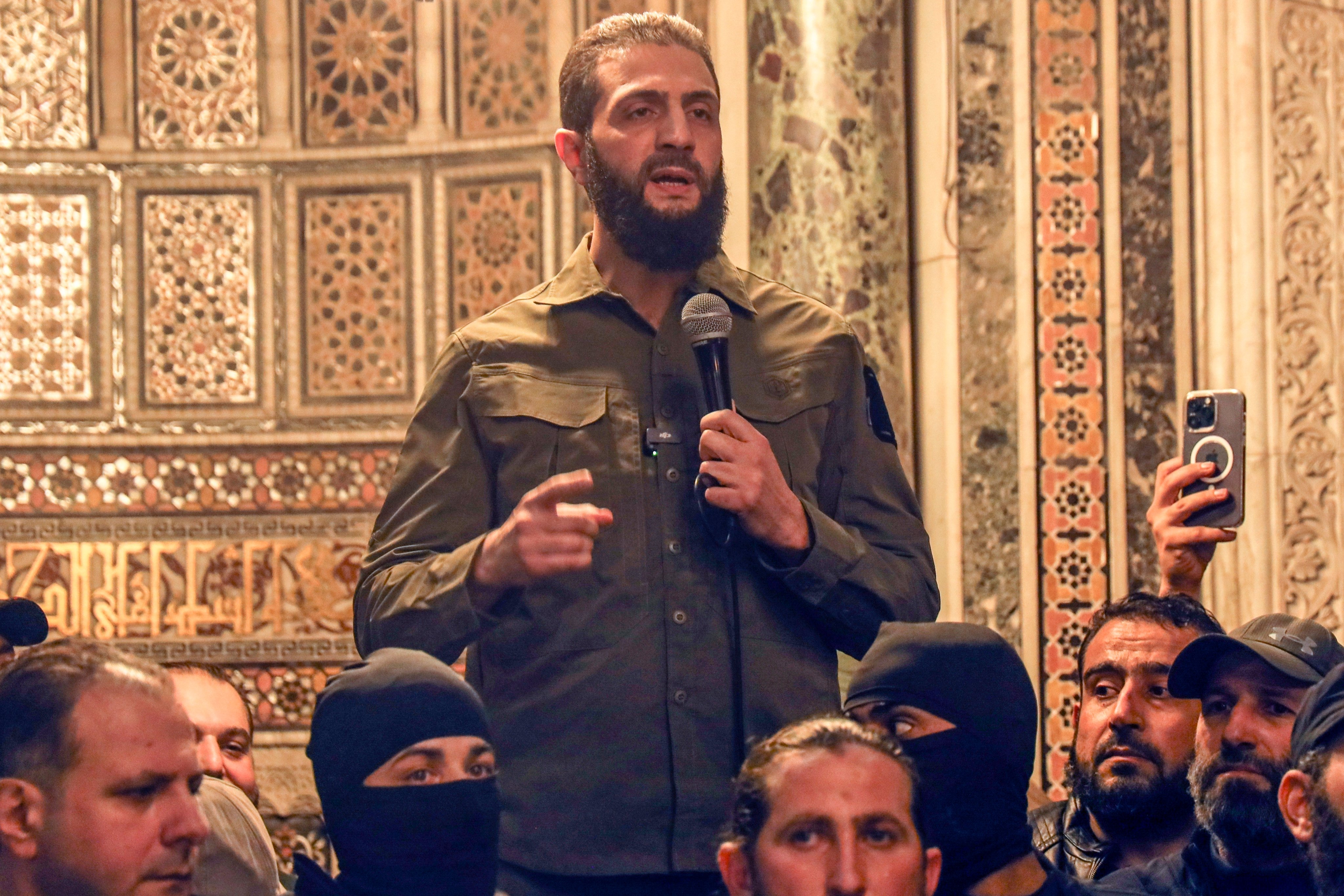 Ahmed al-Sharaa, also known as Abu Mohammed al-Golani, speaks at the Umayyad Mosque in Damascus, Syria, on December 8. Photo: AP