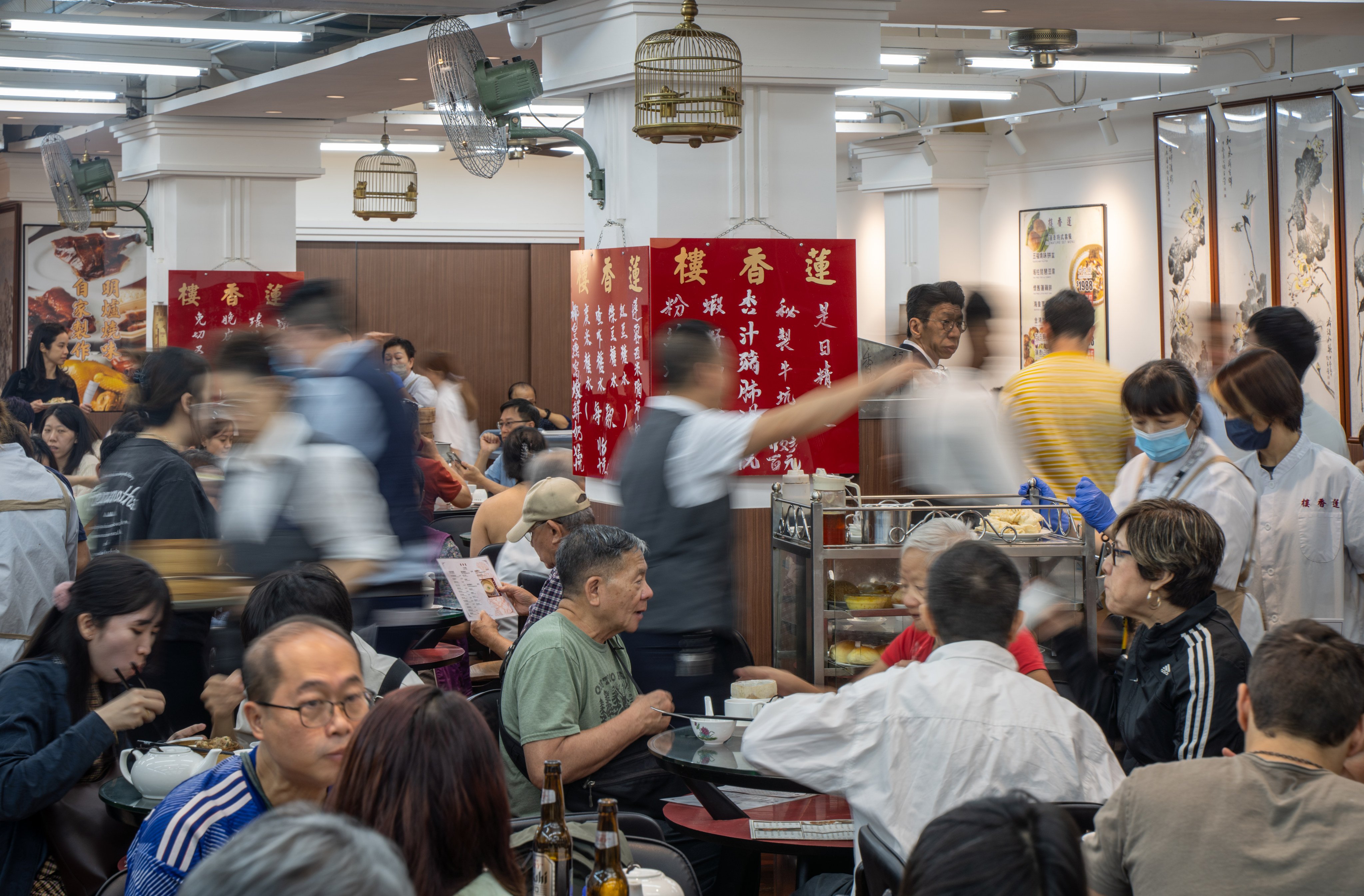 Lin Heung Lau, a 100-year-old resturant in Central, Hong Kong, has kept the traditions of handwritten wall menus and dim sum trolleys. Photo: Alexander Mak