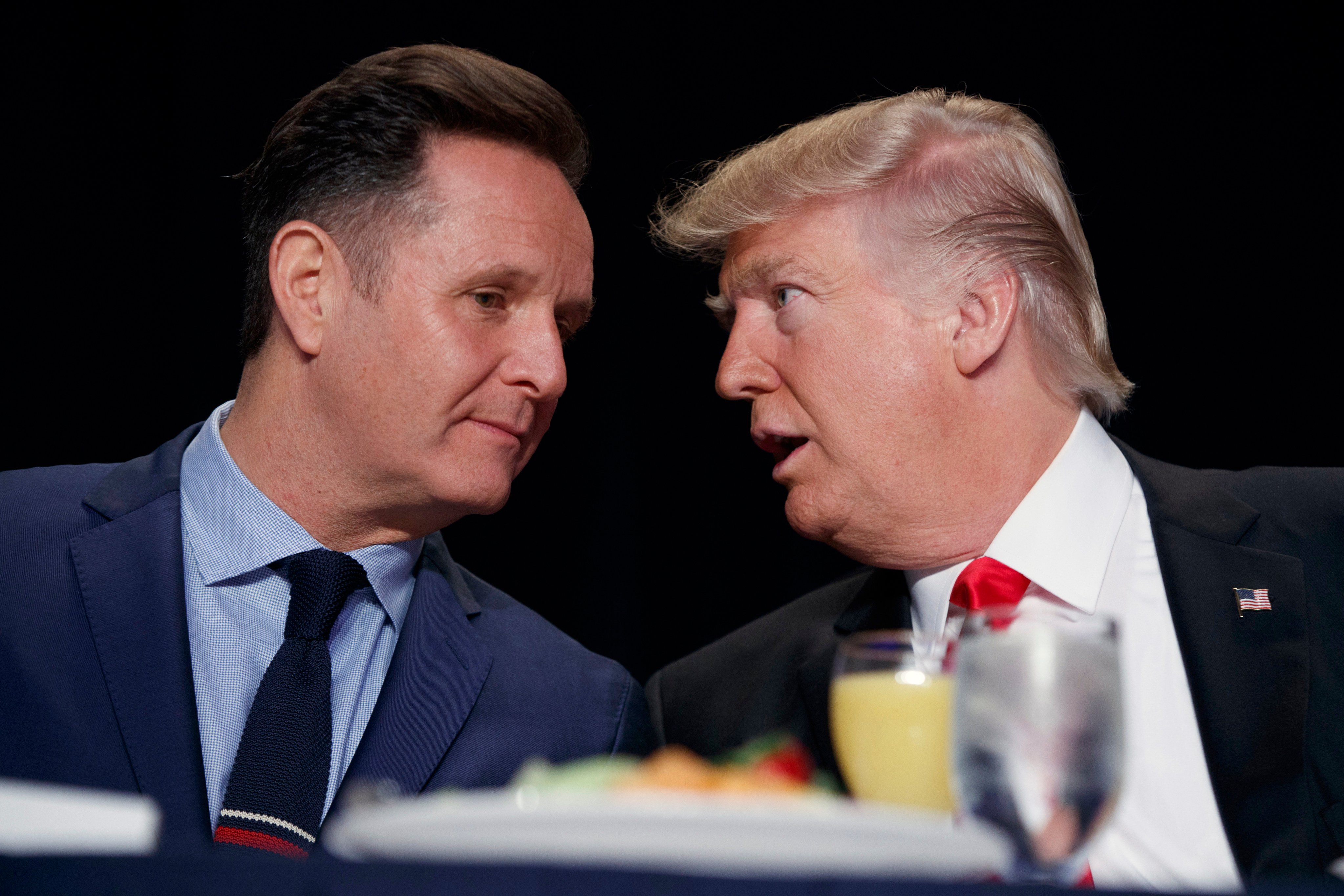 US President Donald Trump (right) talks to television producer Mark Burnett during the National Prayer Breakfast in Washington in February 2017. Photo: AP