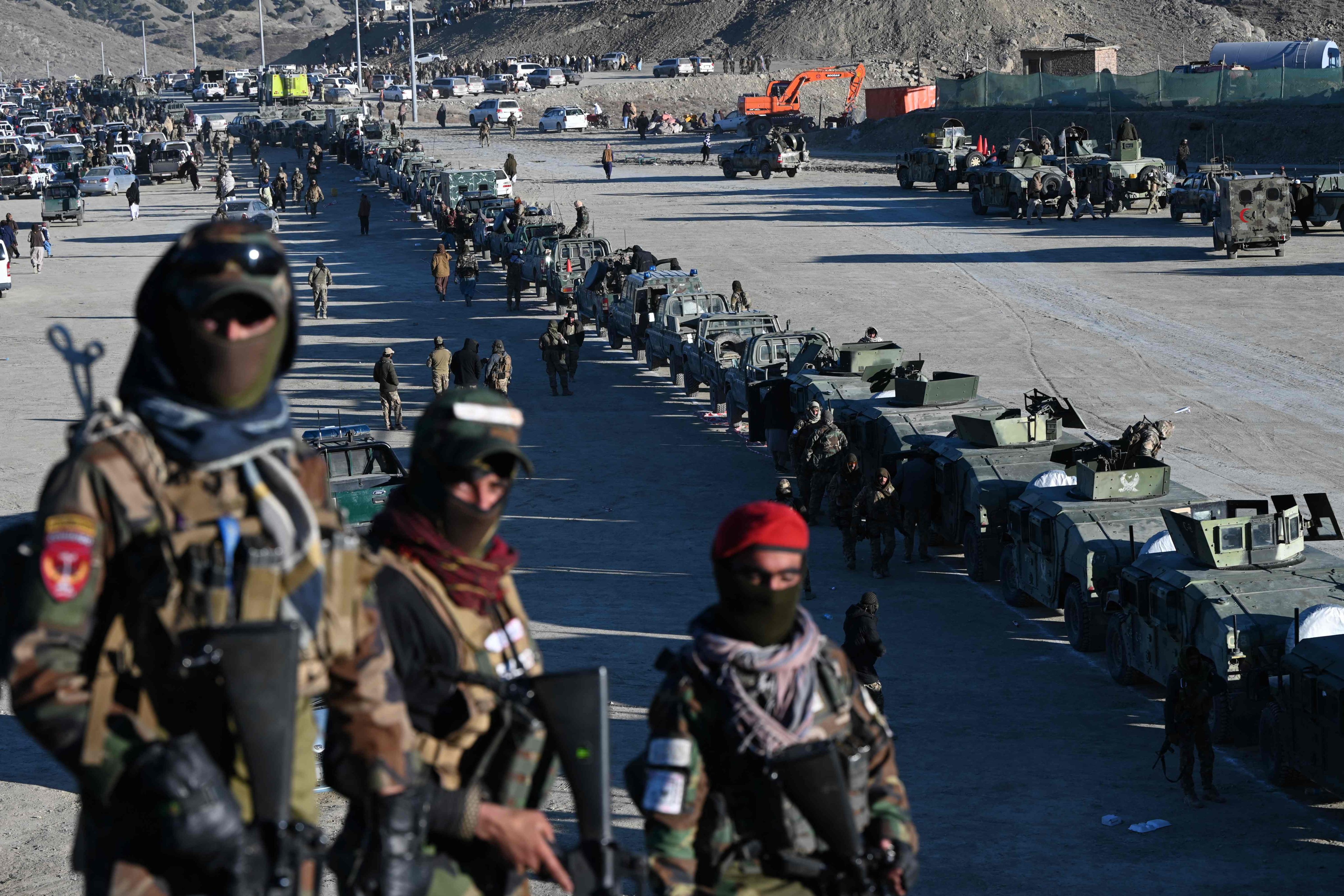 Taliban vehicles are seen parked during the funeral ceremony of Khalil Ur-Rahman Haqqani, the minister for refugees and repatriation who was killed in a terrorist attack, in Sarana, Paktia province, on December 12. Photo: AFP