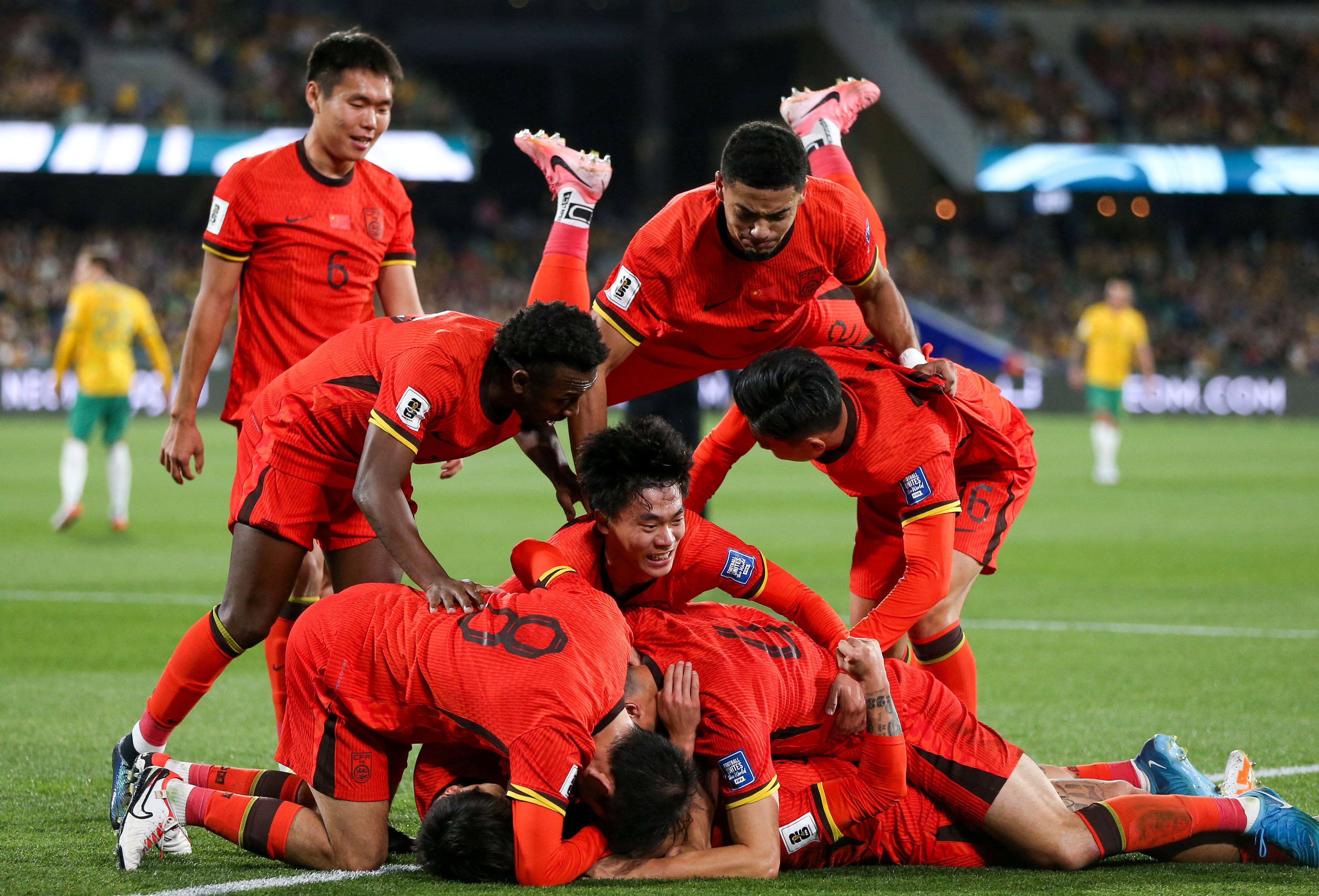 China celebrate Xie Wenneng’s goal against Australia, but the team are bottom of their World Cup qualifying group. Photo: Reuters