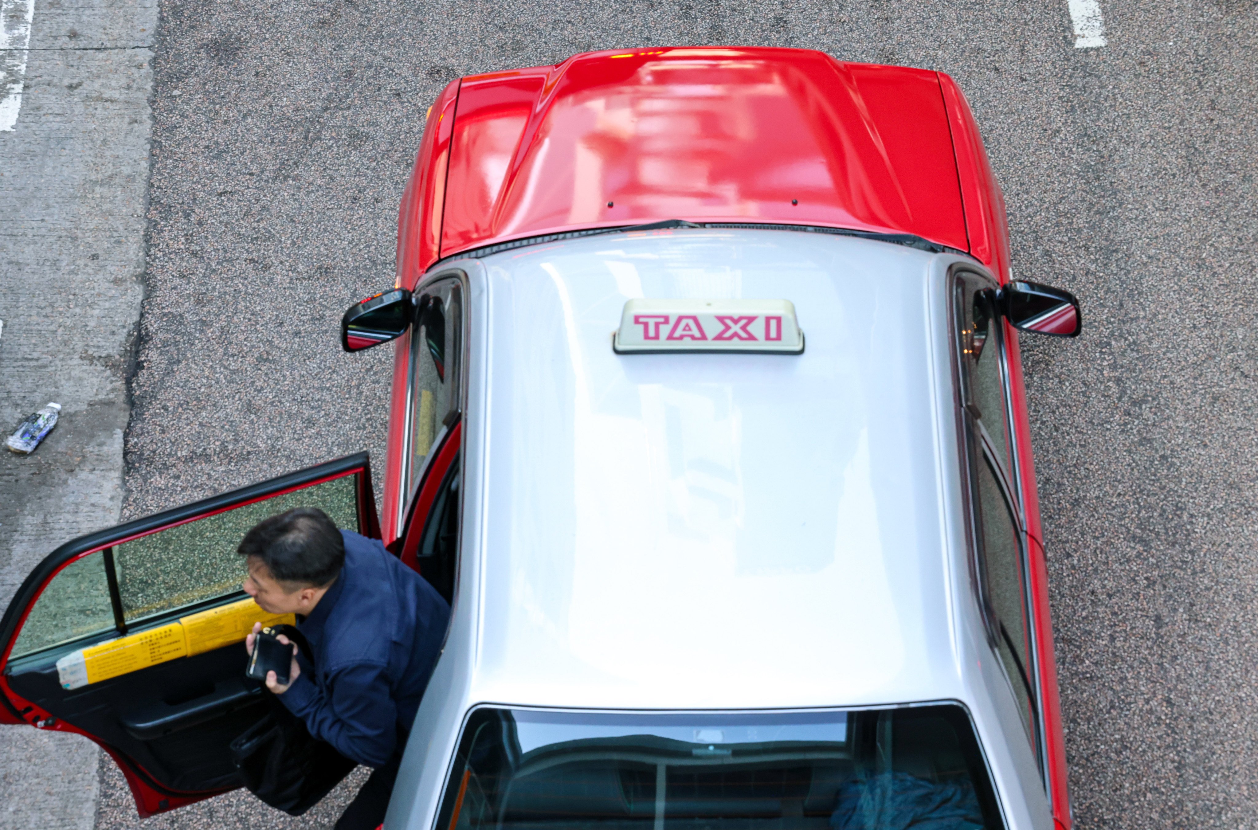 Hong Kong is home to 18,163 taxis, of which 15,250 are red urban taxis. Photo: Jelly Tse