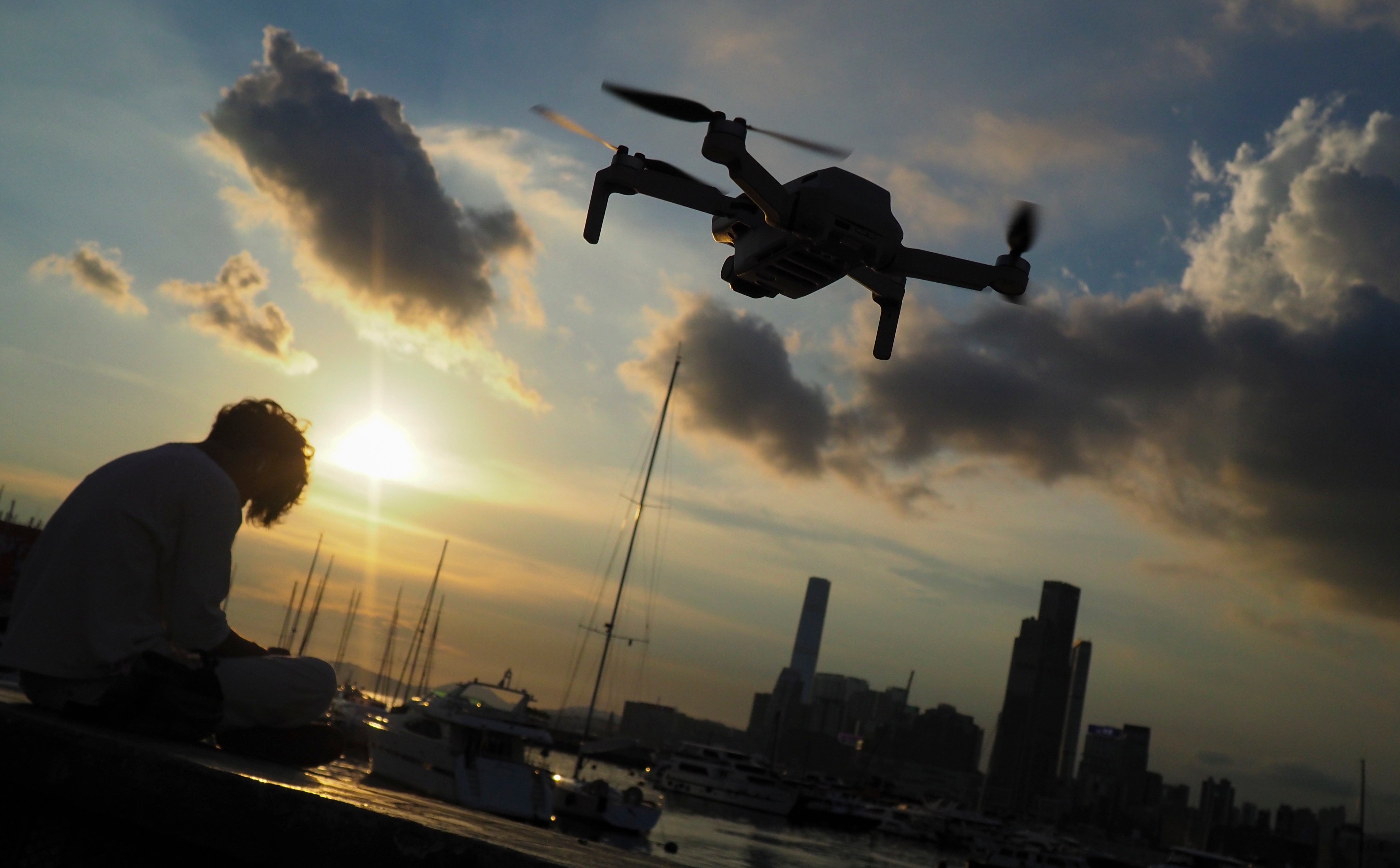 A drone hovers over the harbour at Hong Kong’s Causeway Bay. Photo: Martin Chan