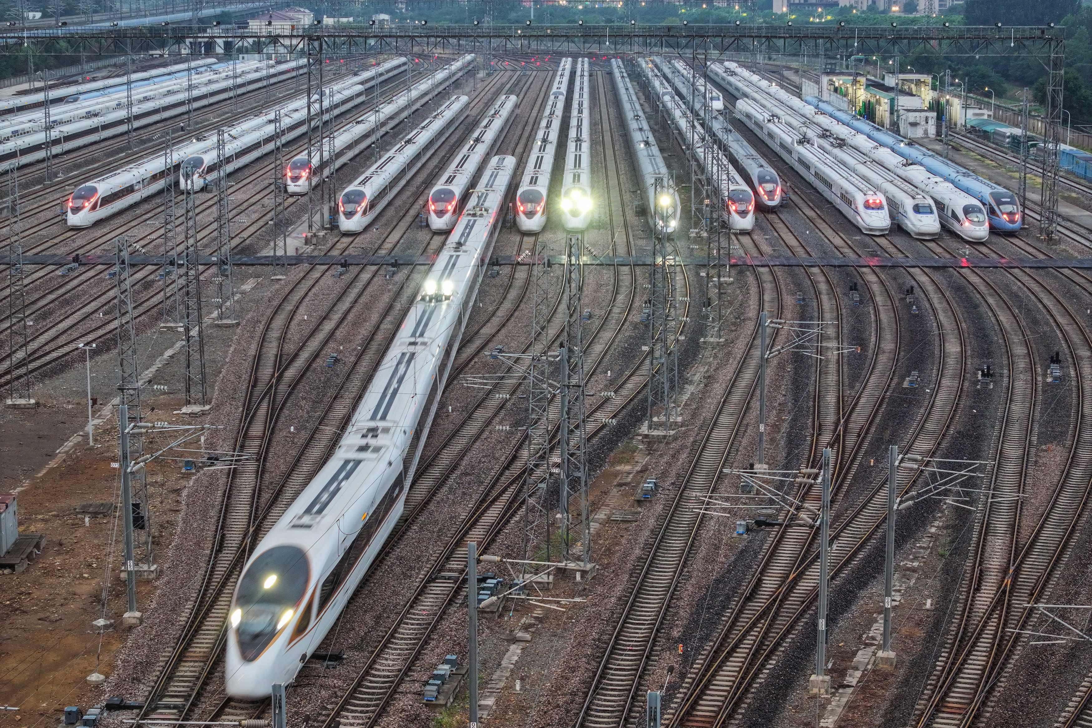 A bullet train leaves Nanjing South railway station in Jiangsu province in August. Photo: AFP