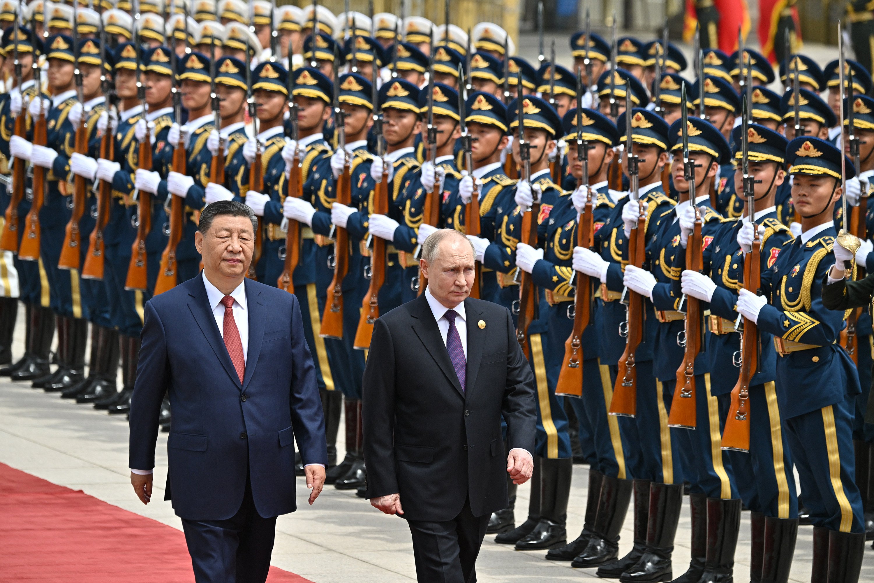 Russia’s President Vladimir Putin, left, and China’s President Xi Jinping in front of the Great Hall of the People in Tiananmen Square, Beijing in May. Photo: Pool / AFP / Getty Images / TNS