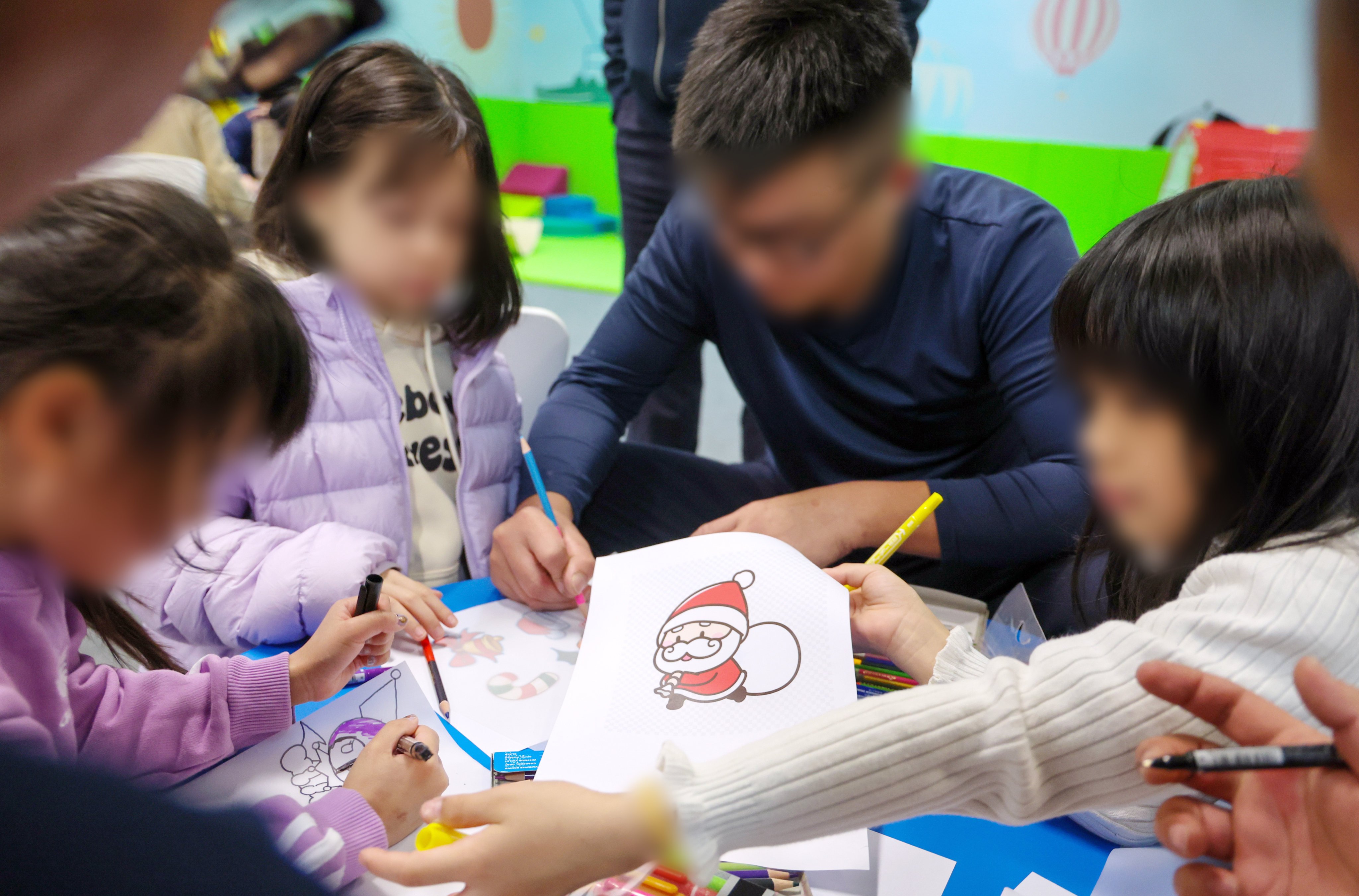 Male inmates interact with their children. Photo: Dickson Lee