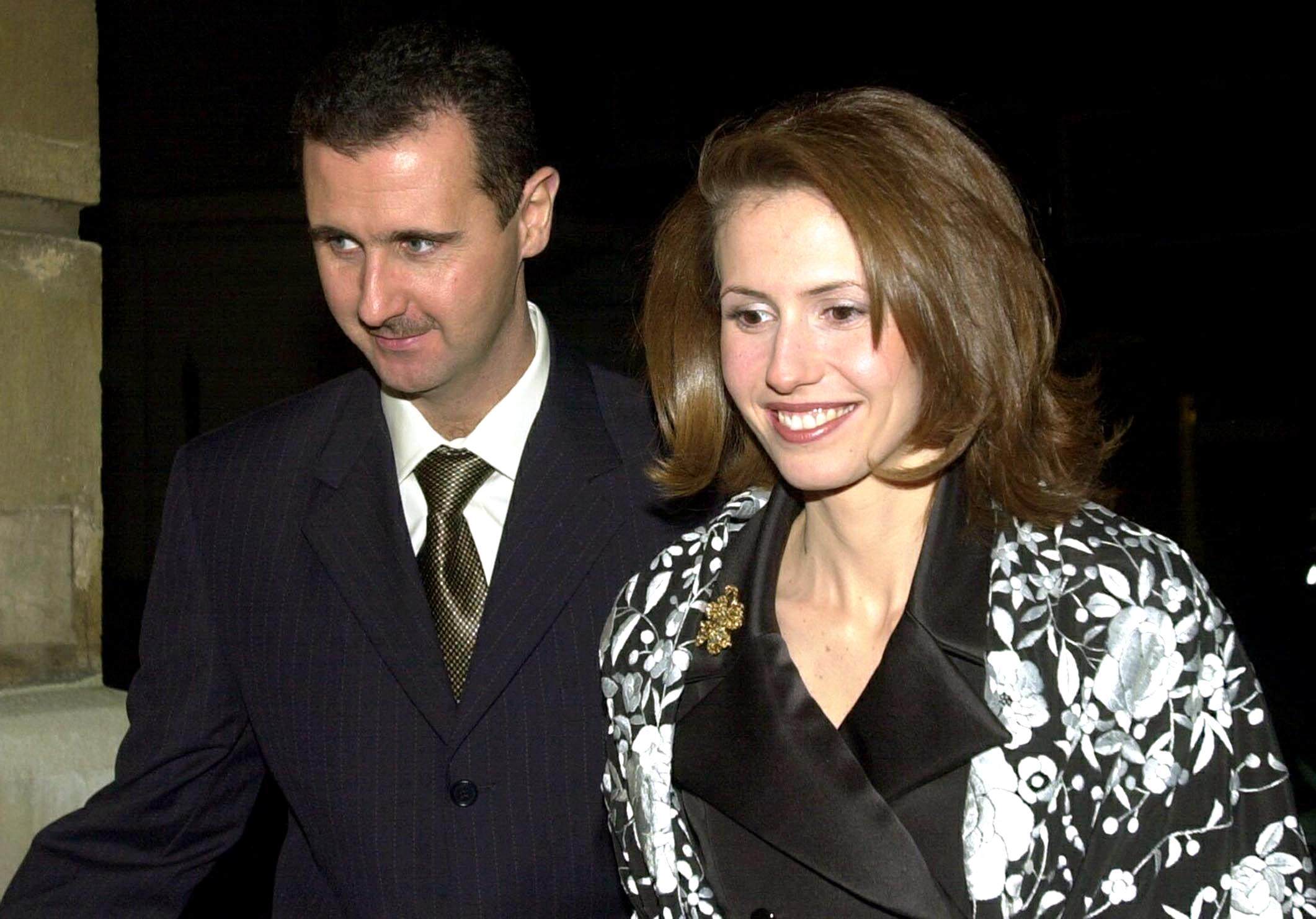 Then-Syrian President Bashar al-Assad and his wife, Asma, arrive for a dinner hosted by Britain’s Lord Chancellor, Lord Irvine of Lairg, at Lancaster house in London in December 2002. Photo: AFP