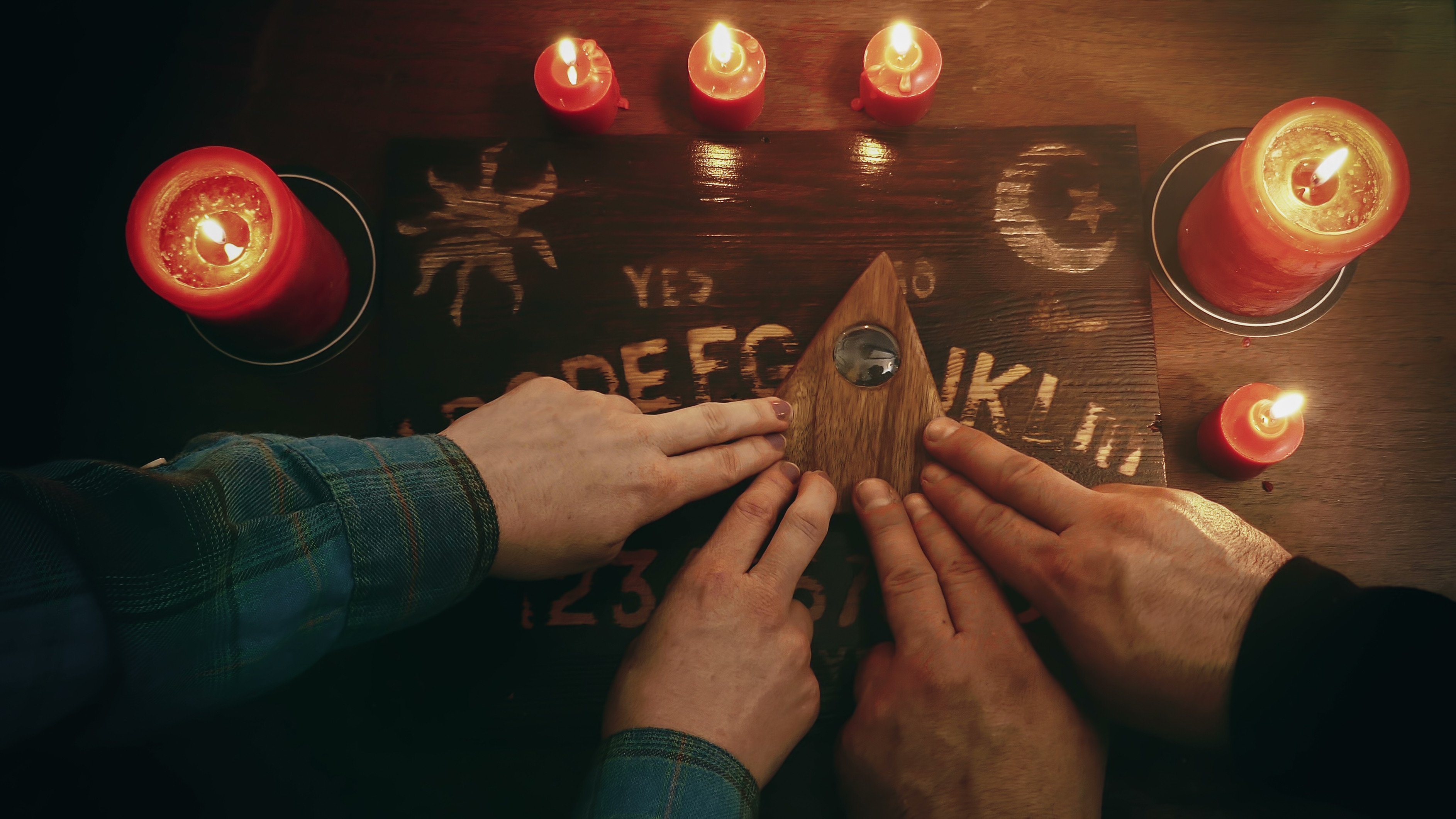 A professor’s focus on anomalistic psychology tries to understand belief in phenomena not supported by science, such as the use of Ouija boards (pictured) to communicate with the dead. Photo: Shutterstock
 