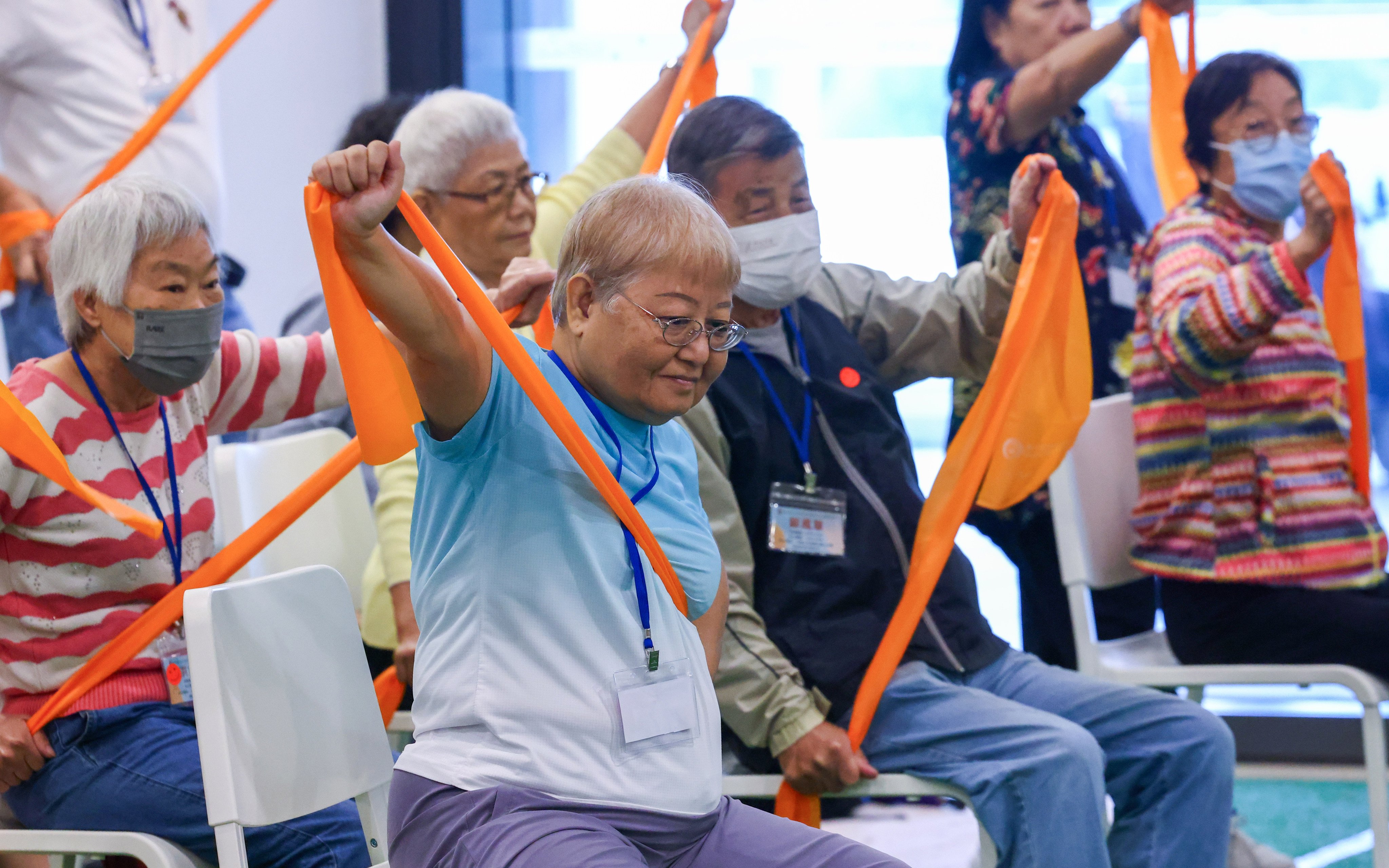 Elderly residents in a stretching group exercise on November 15, 2024. Photo: Dickson Lee