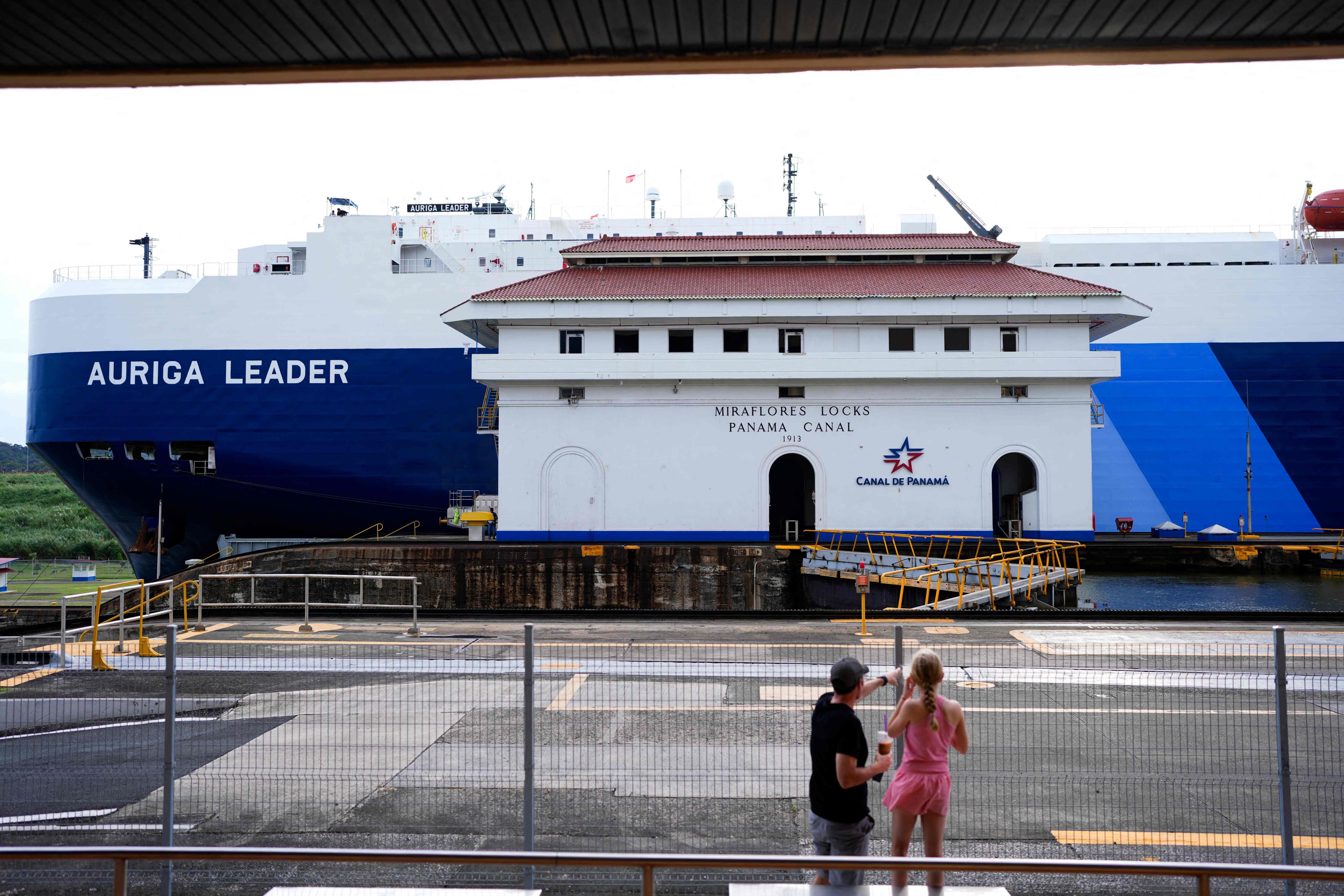 Tourists look at the Miraflores Locks of the Panama Canal in Panama City. Photo: AFP