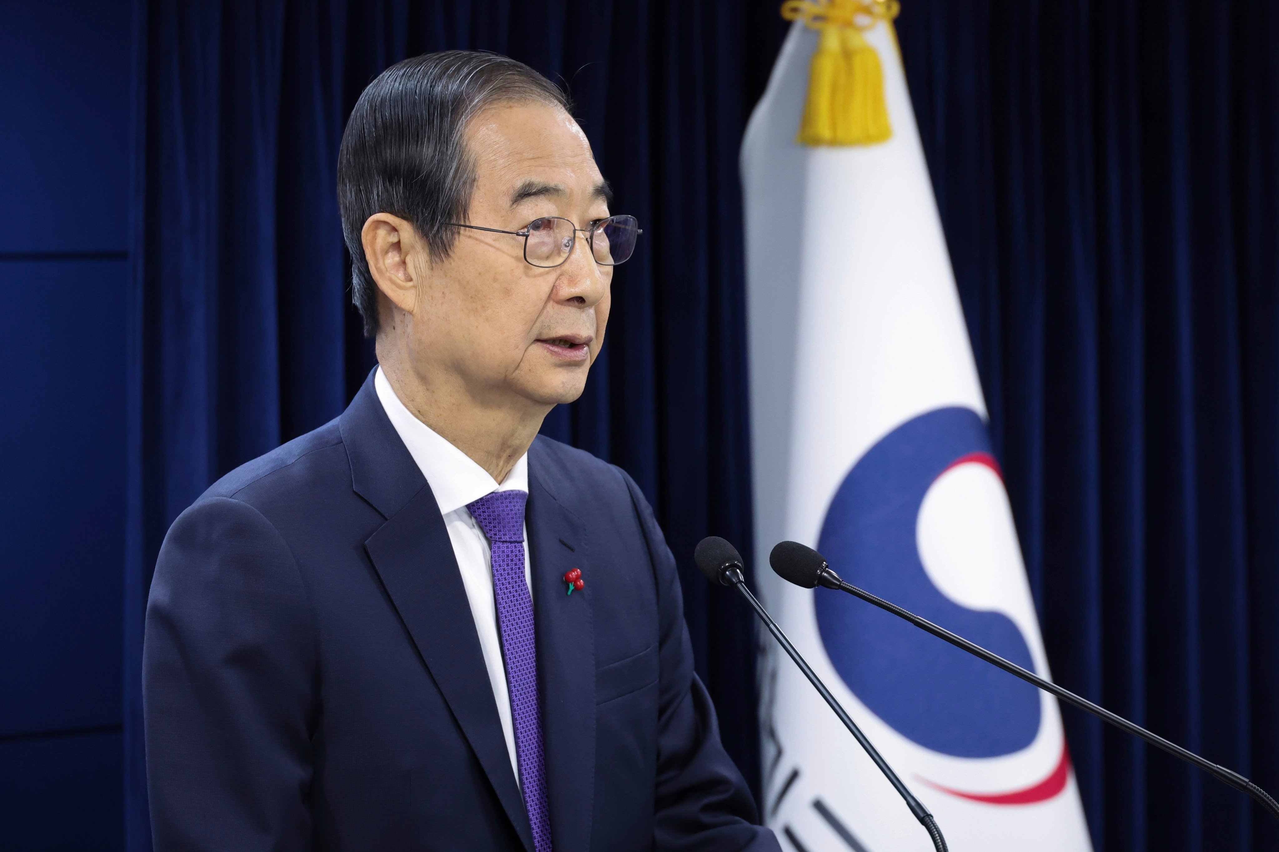 South Korean acting President Han Duck-soo speaks at the government complex in Seoul on December 26. Photo: AP