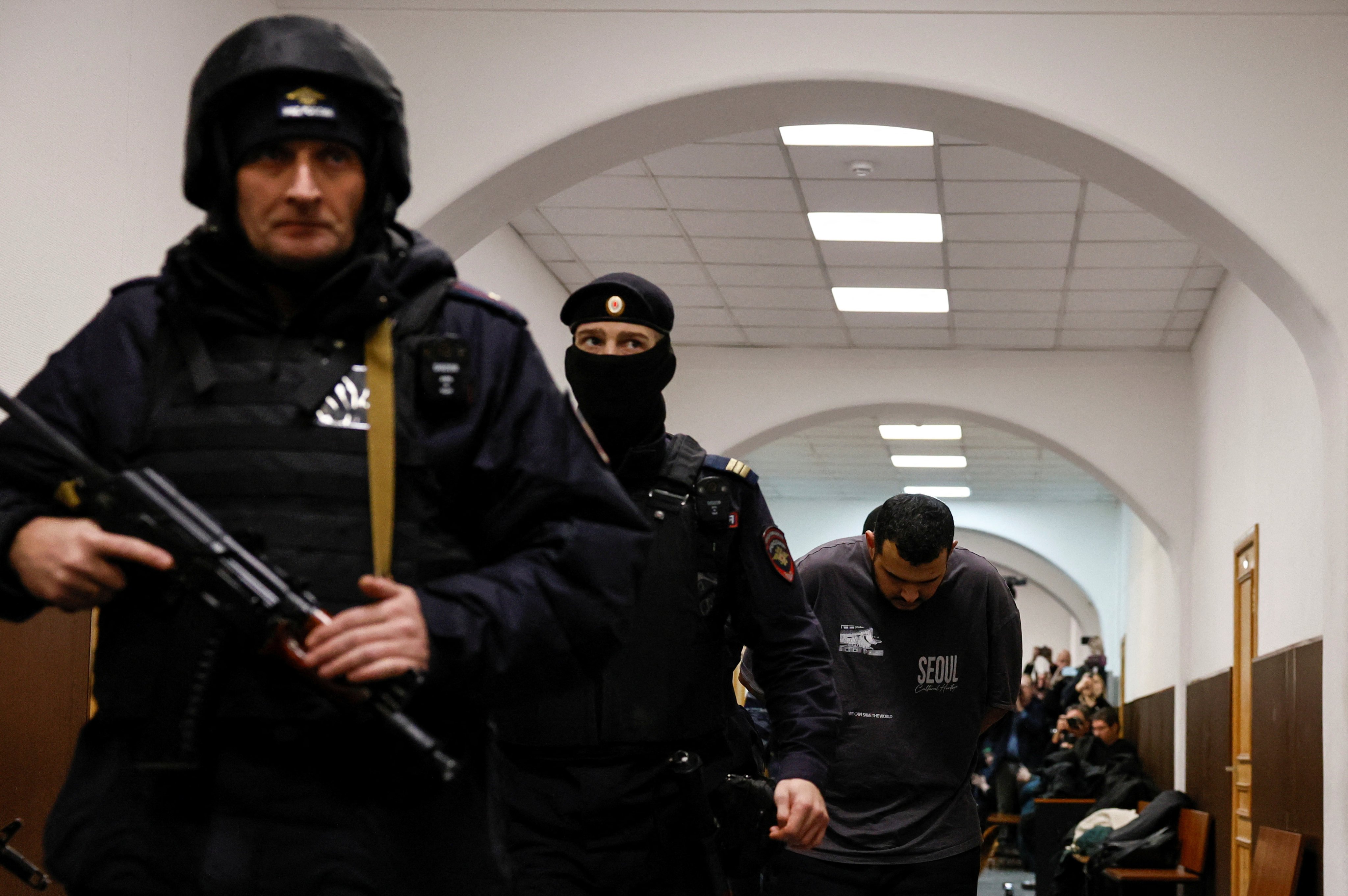 A suspect in the killing of Russian general Igor Kirillov arrives at a court in Moscow on December 19. Photo: Reuters
