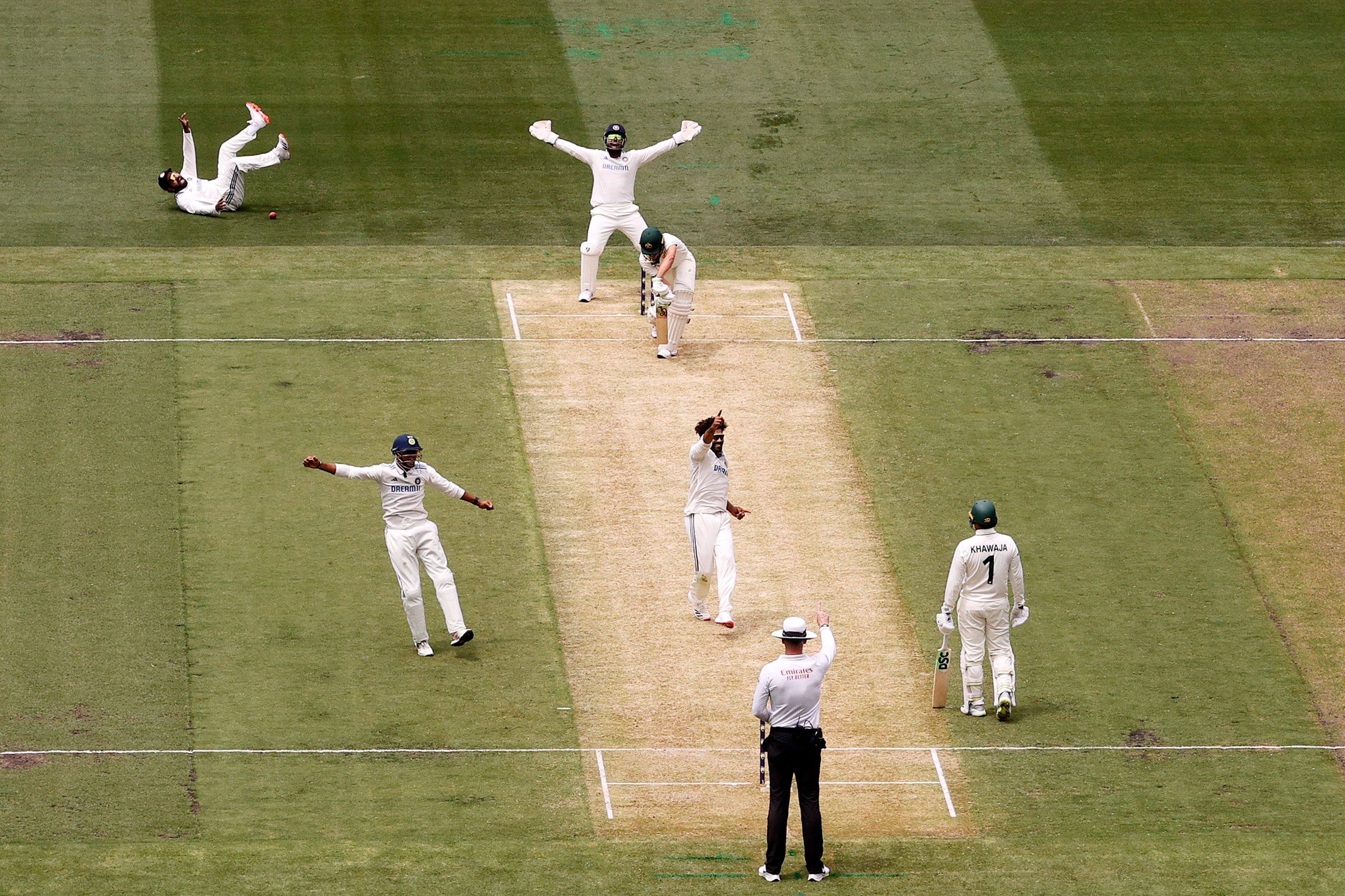 India’s players celebrate the wicket of Australia’s Sam Konstas on day one of the fourth Test match at the Melbourne Cricket Ground on Thursday. Photo: AFP