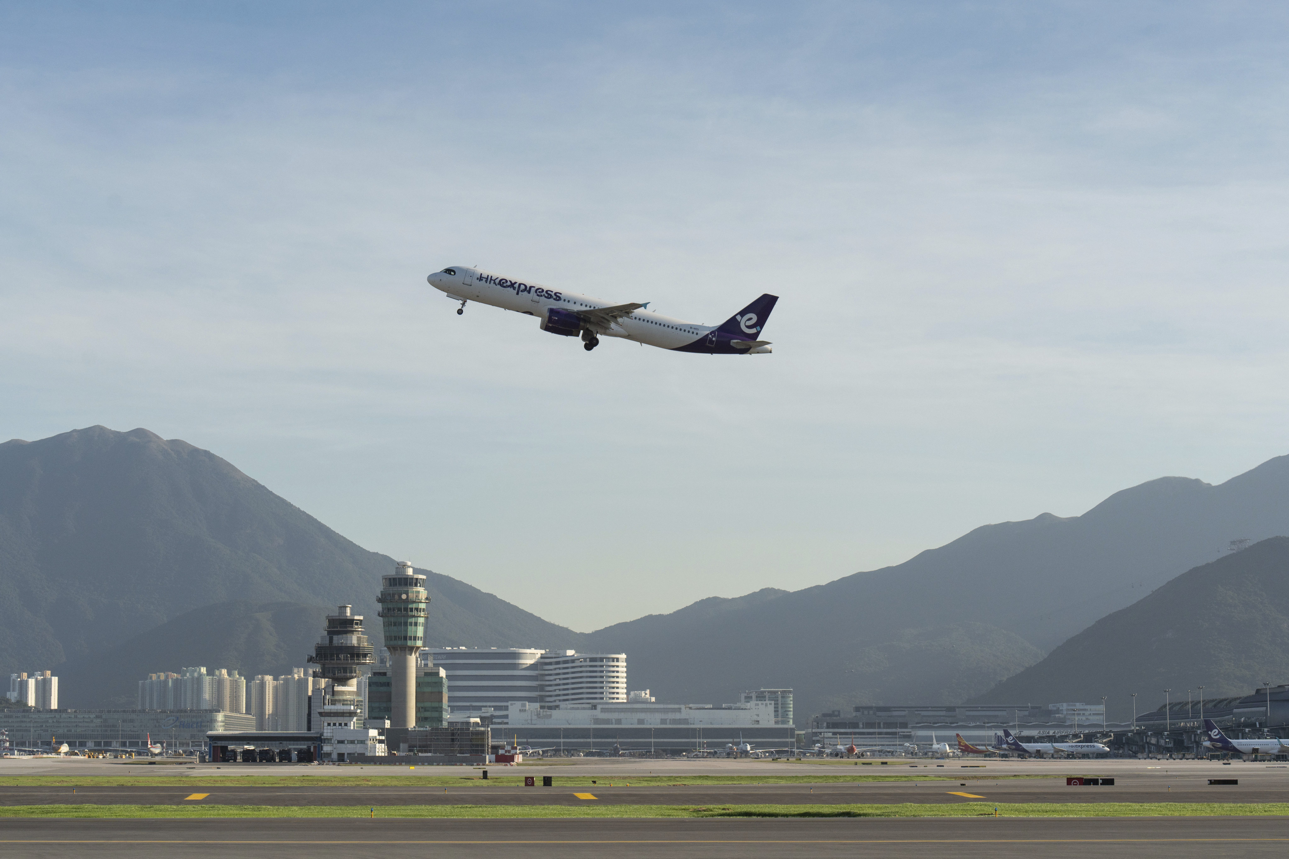 A plane takes off from Hong Kong International Airport on November 27. Airport-related jobs are expected to increase to 123,000 by 2030, to keep up with traffic volume. Photo: AP 