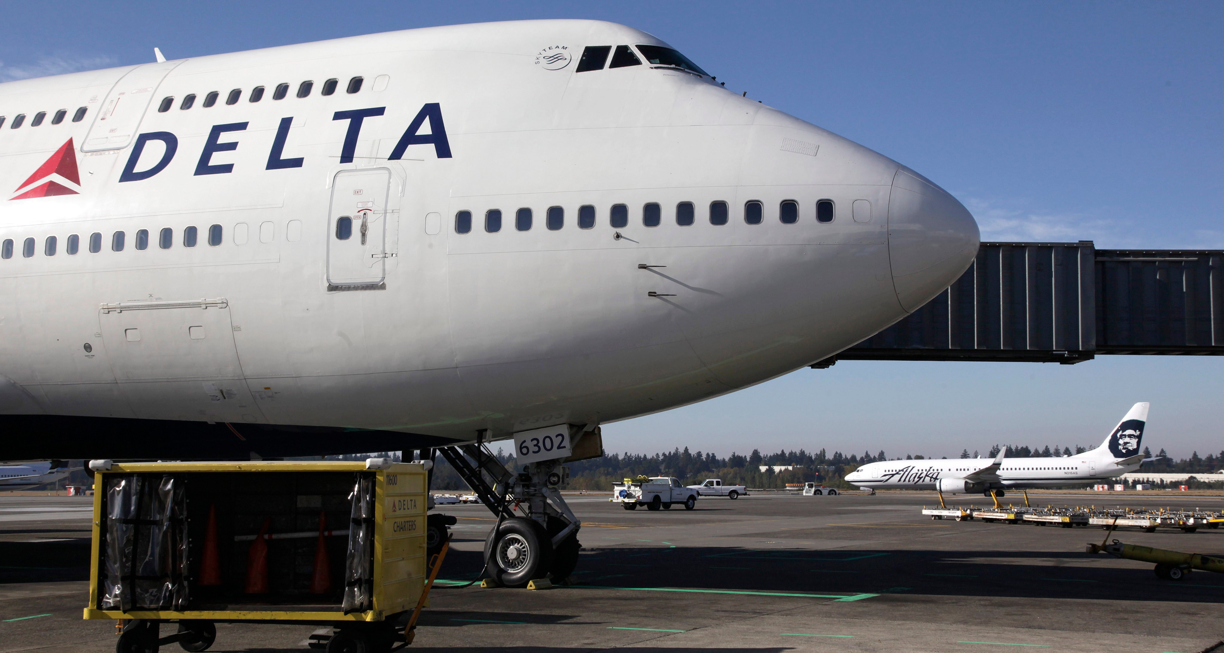 An unticketed passenger was discovered as Delta flight 487 was taxiing to the runway at Seattle-Tacoma International Airport. Photo: ap