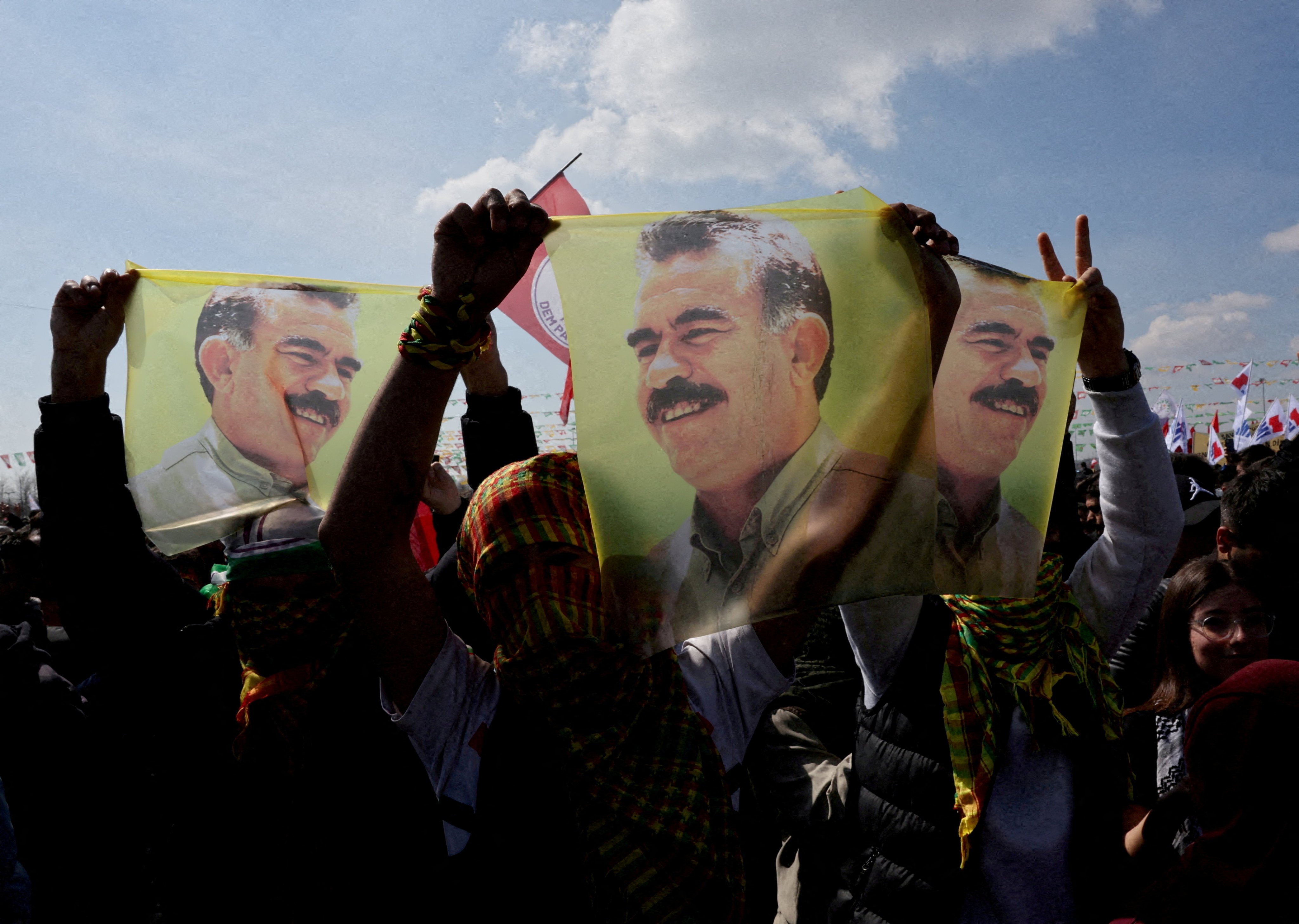 Supporters of the pro-Kurdish Peoples’ Equality and Democracy Party (DEM Party) display flags with a portrait of jailed Kurdistan Workers Party (PKK) leader Abdullah Ocalan, in Istanbul, Turkey, on March 17. Photo: Reuters