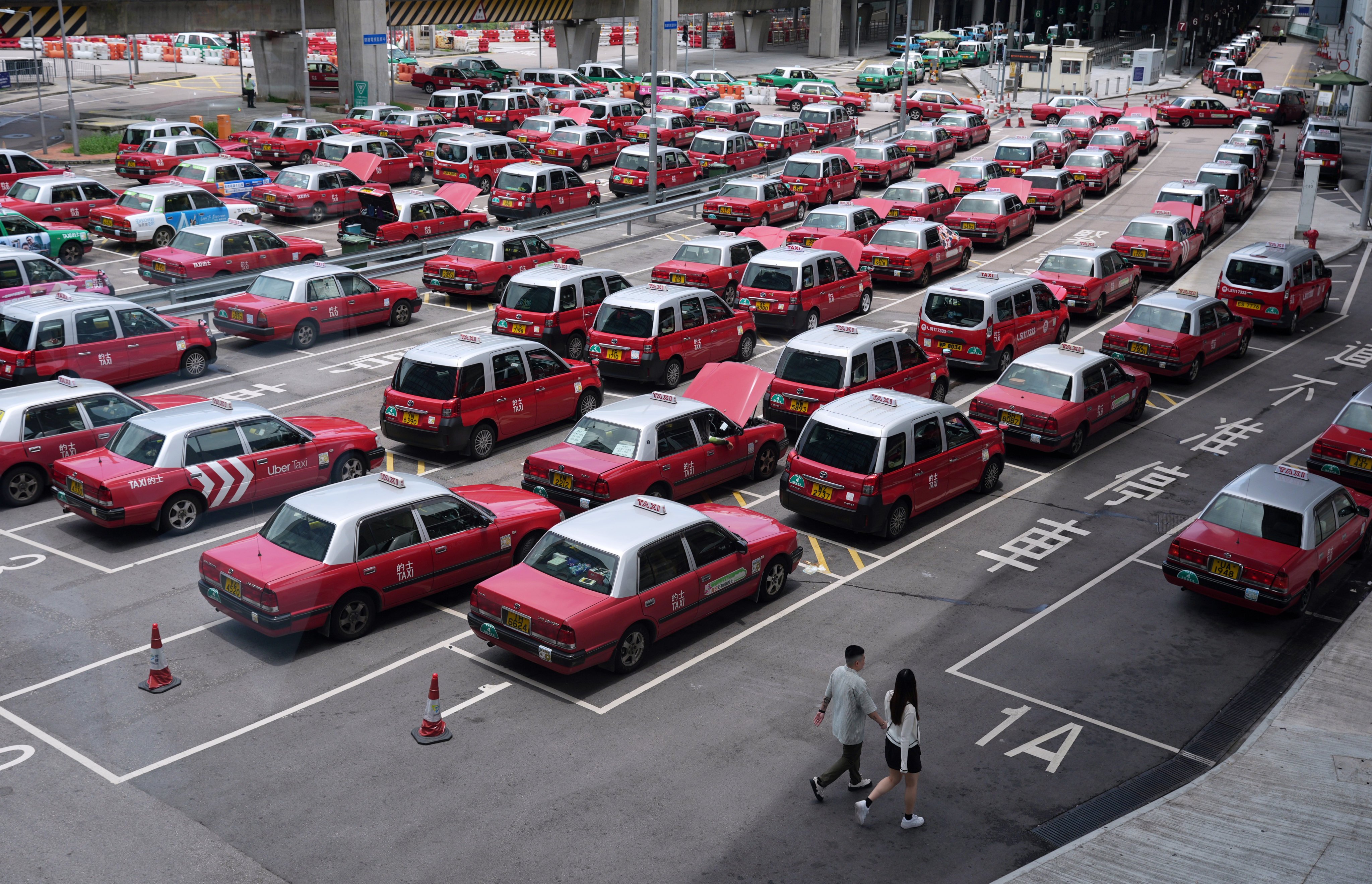 Hong Kong’s taxi trade has a bad reputation, with new premium fleet licences launched with the aim of improving standards. Photo: Eugene Lee