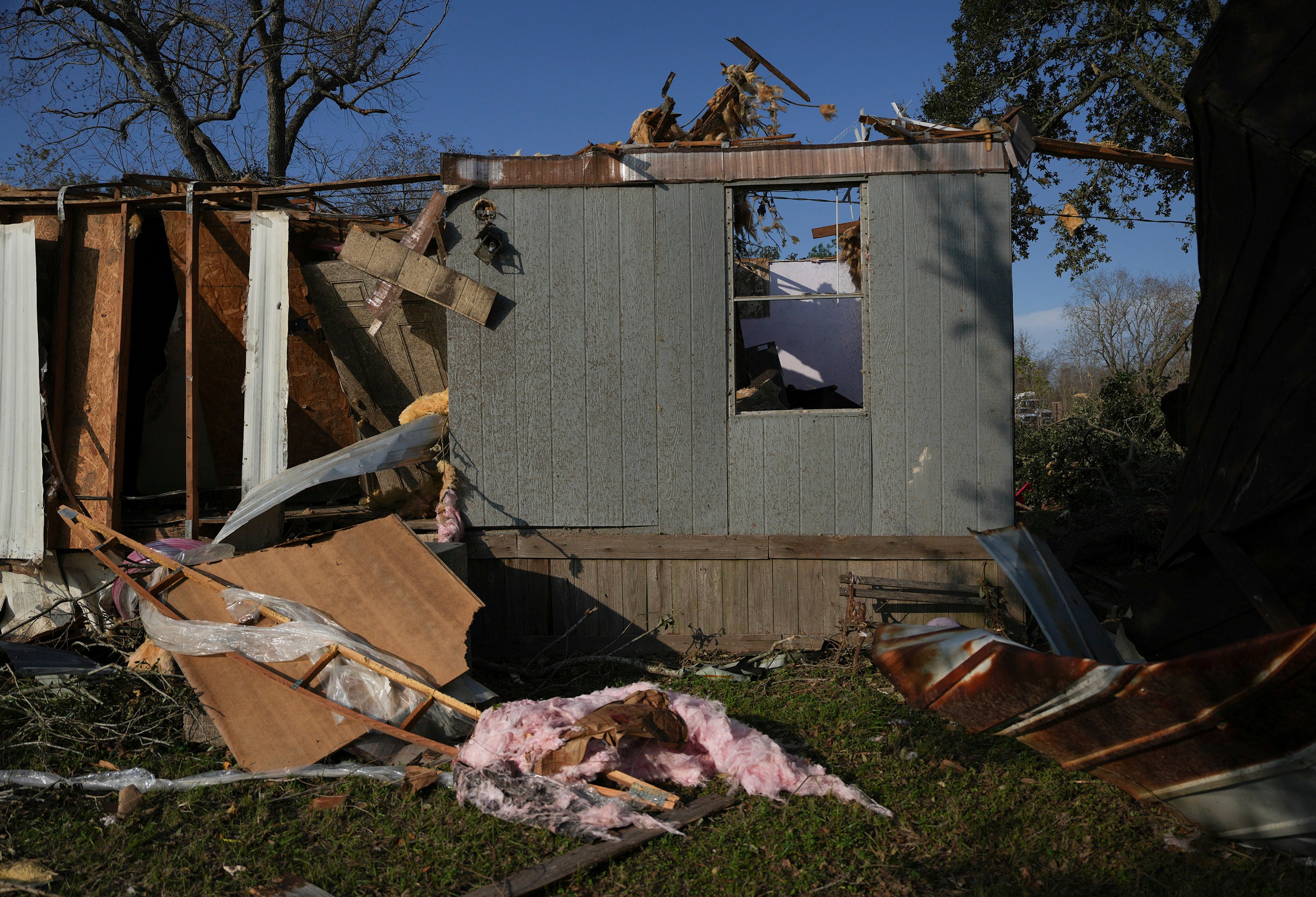 A mobile home sits damaged following a tornado that went through Katy, Texas on Saturday. Photo: AP