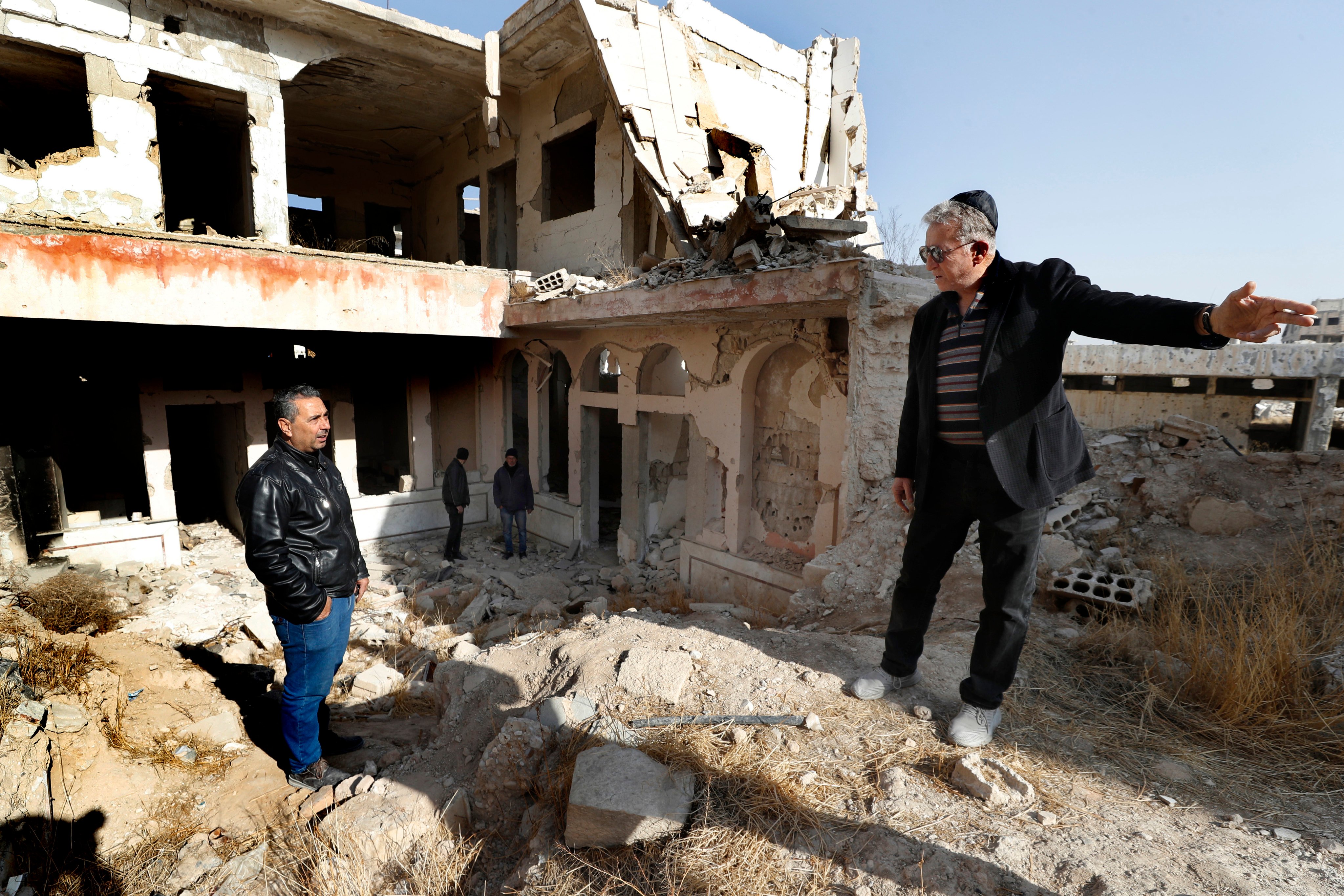 Bakhour Chamantoub, 74 (right) the head of the Jewish community in Syria and one of the people who refused to leave Syria. Photo: AP