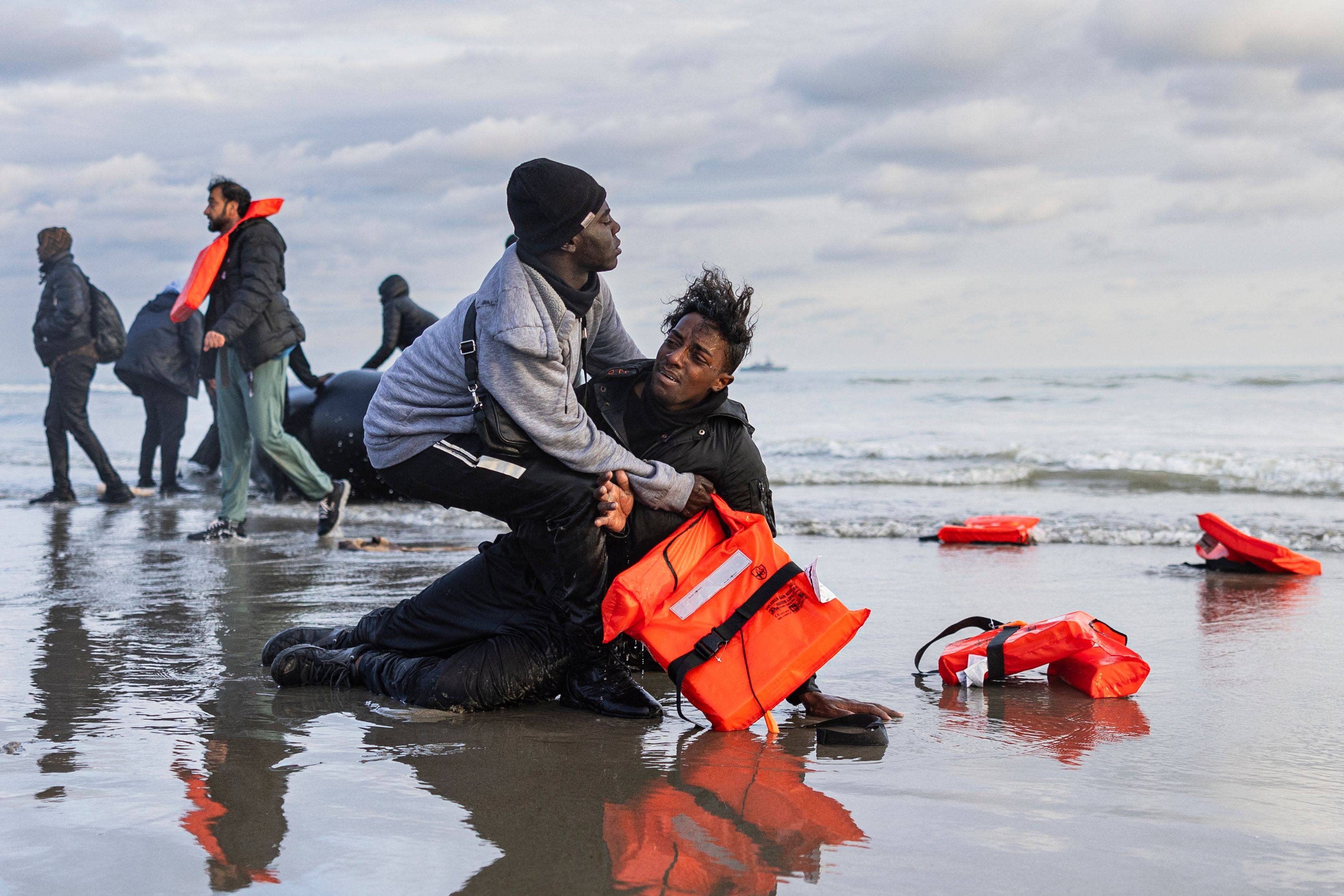 A Sudanese migrant taken to shore after leaving a smuggler’s boat, which was punctured by French police officers to prevent migrants from attempting to cross the English Channel. Photo: AFP