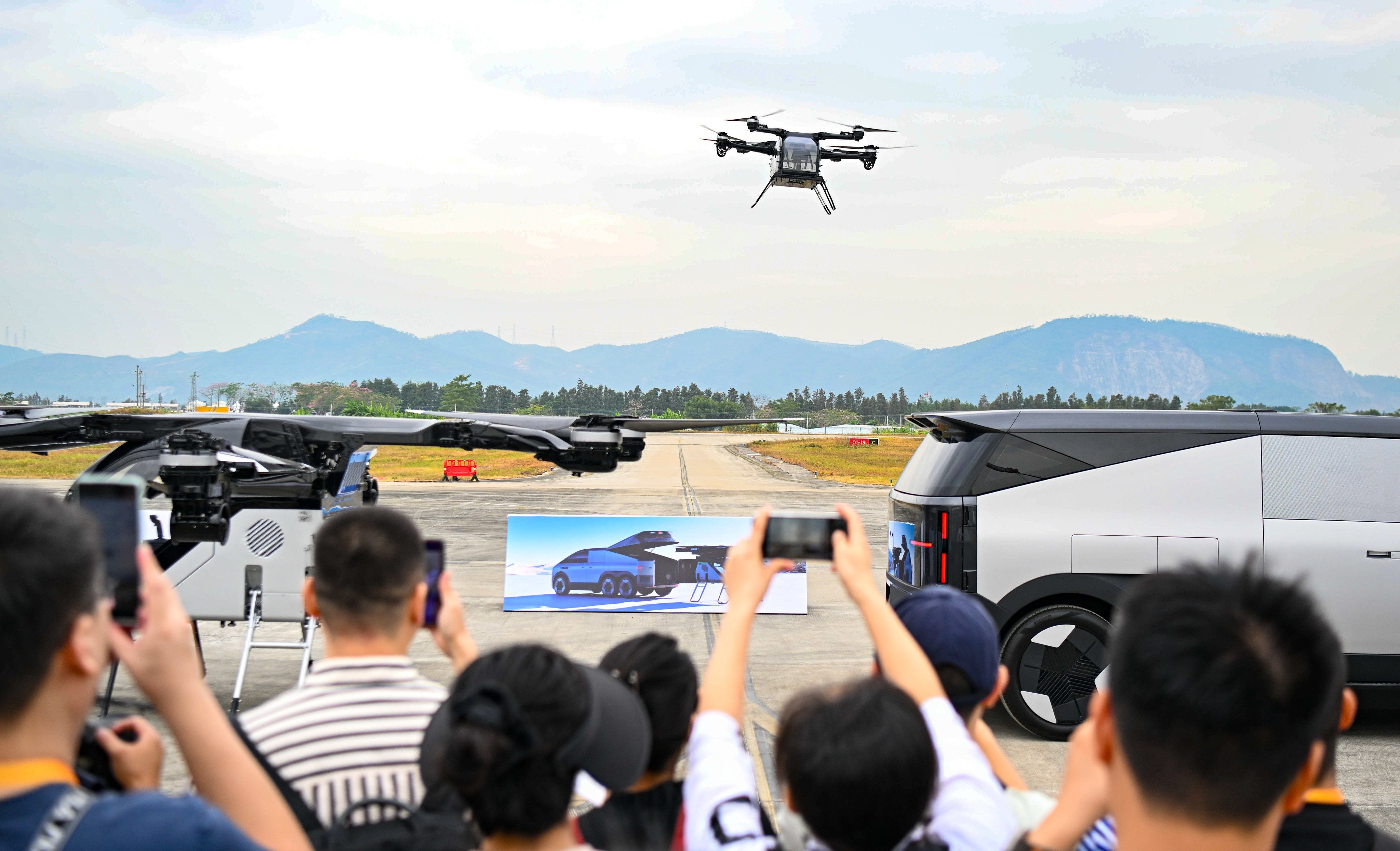 A Chinese-made flying car draws crowds at the premier Zhuhai Airshow, in southern China in November. Photo: Xinhua  