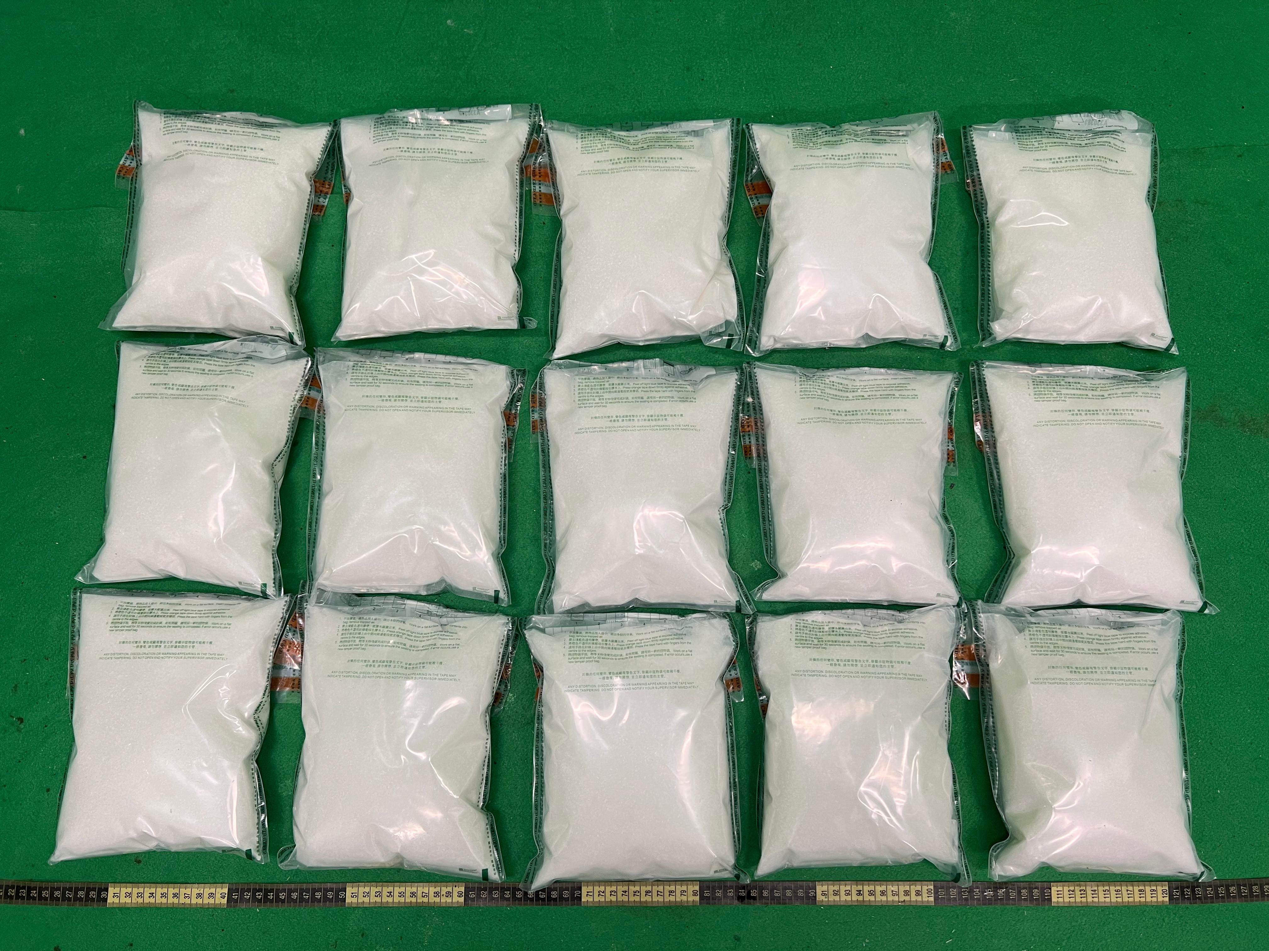 In the first of two cases, officers at Hong Kong airport found 15 bags of suspected ketamine in a male passenger’s luggage. Photo: Handout 